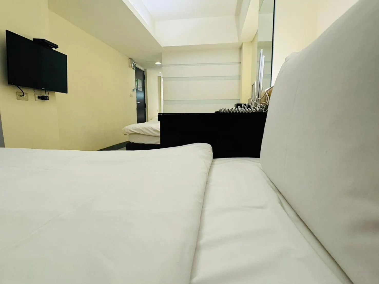 Photo of the whole room, Bed in Kiwi Express Hotel - Kaohsiung Station