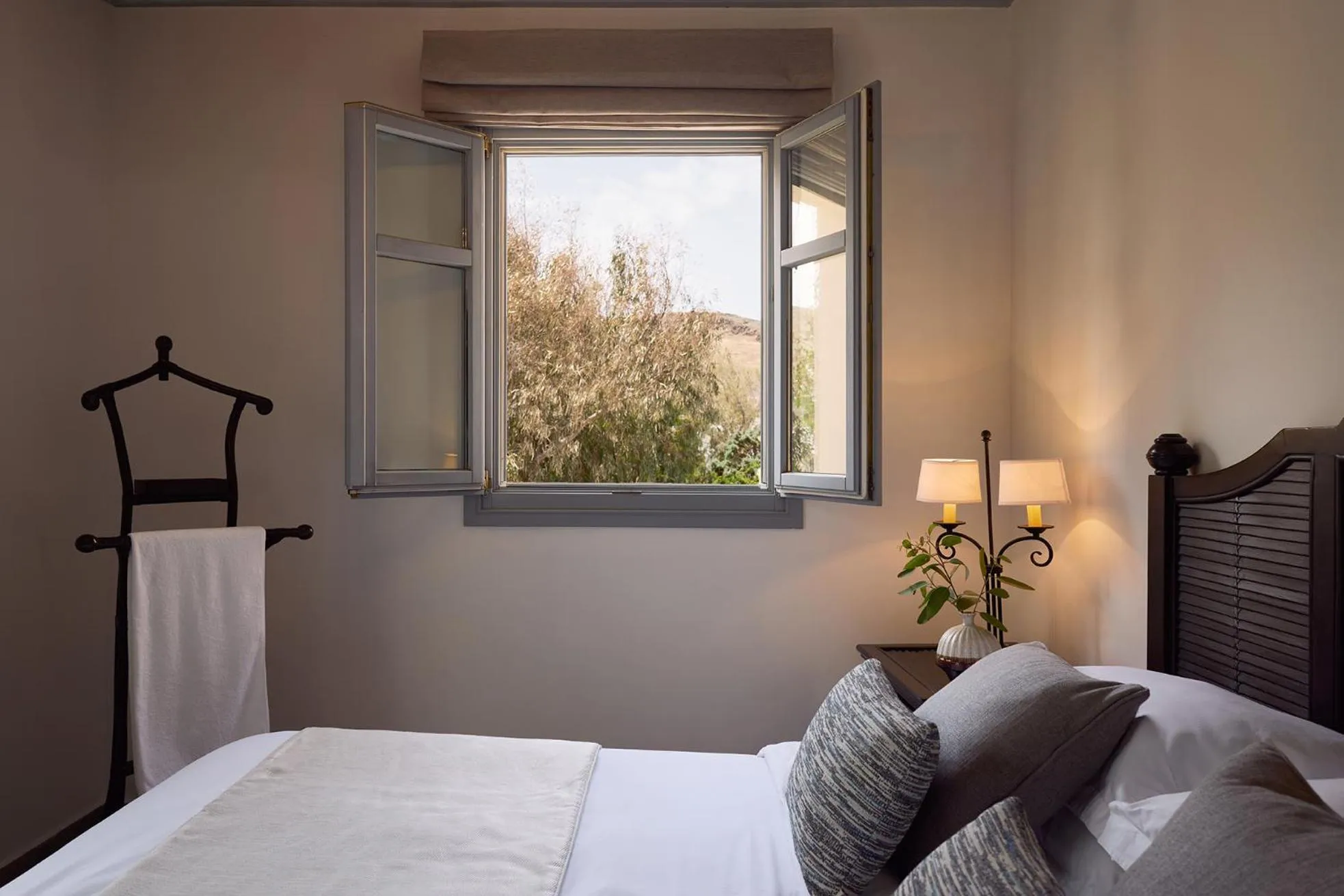 Bed in Porto Kea Suites by Sandglass