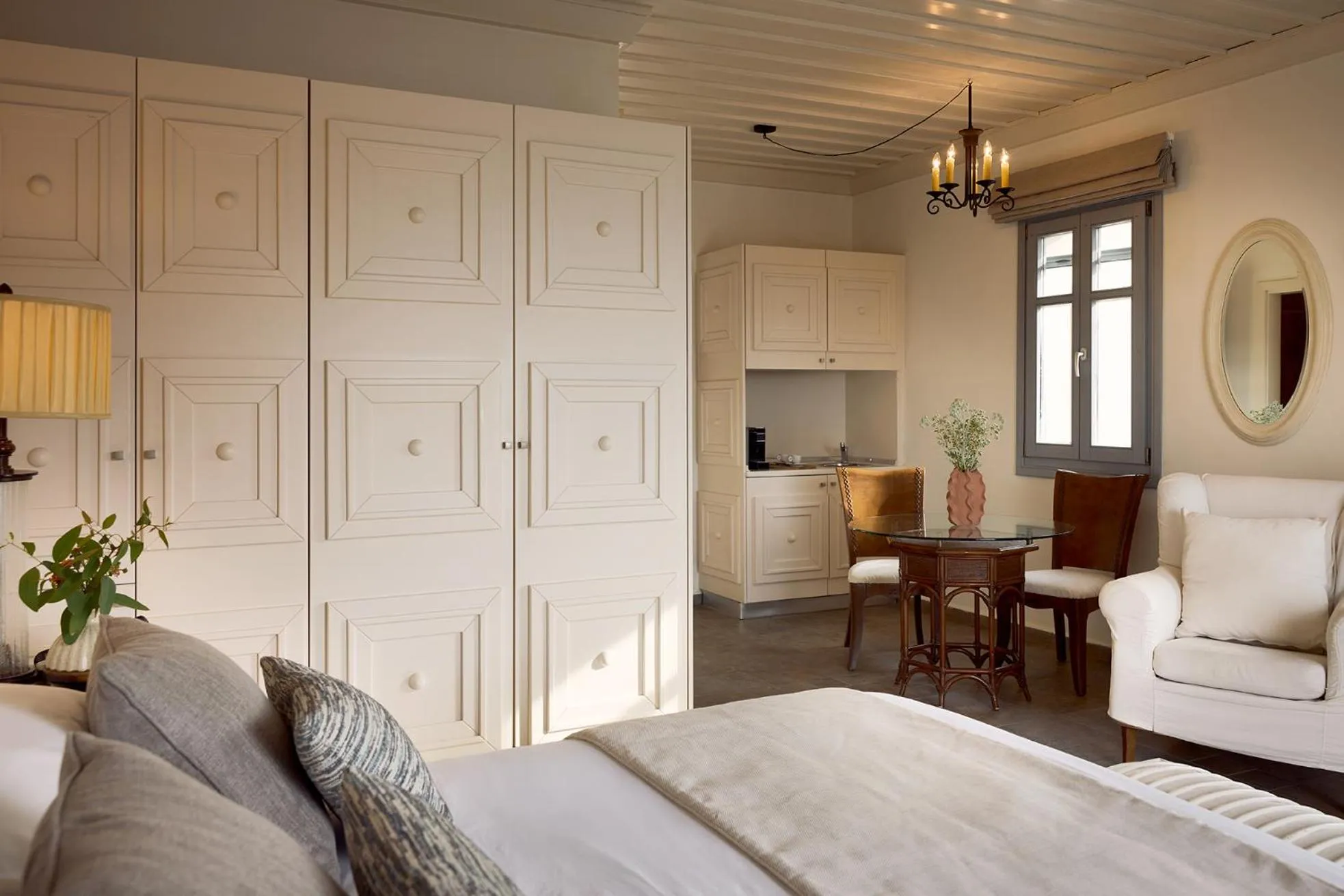 Living room, Bed in Porto Kea Suites by Sandglass