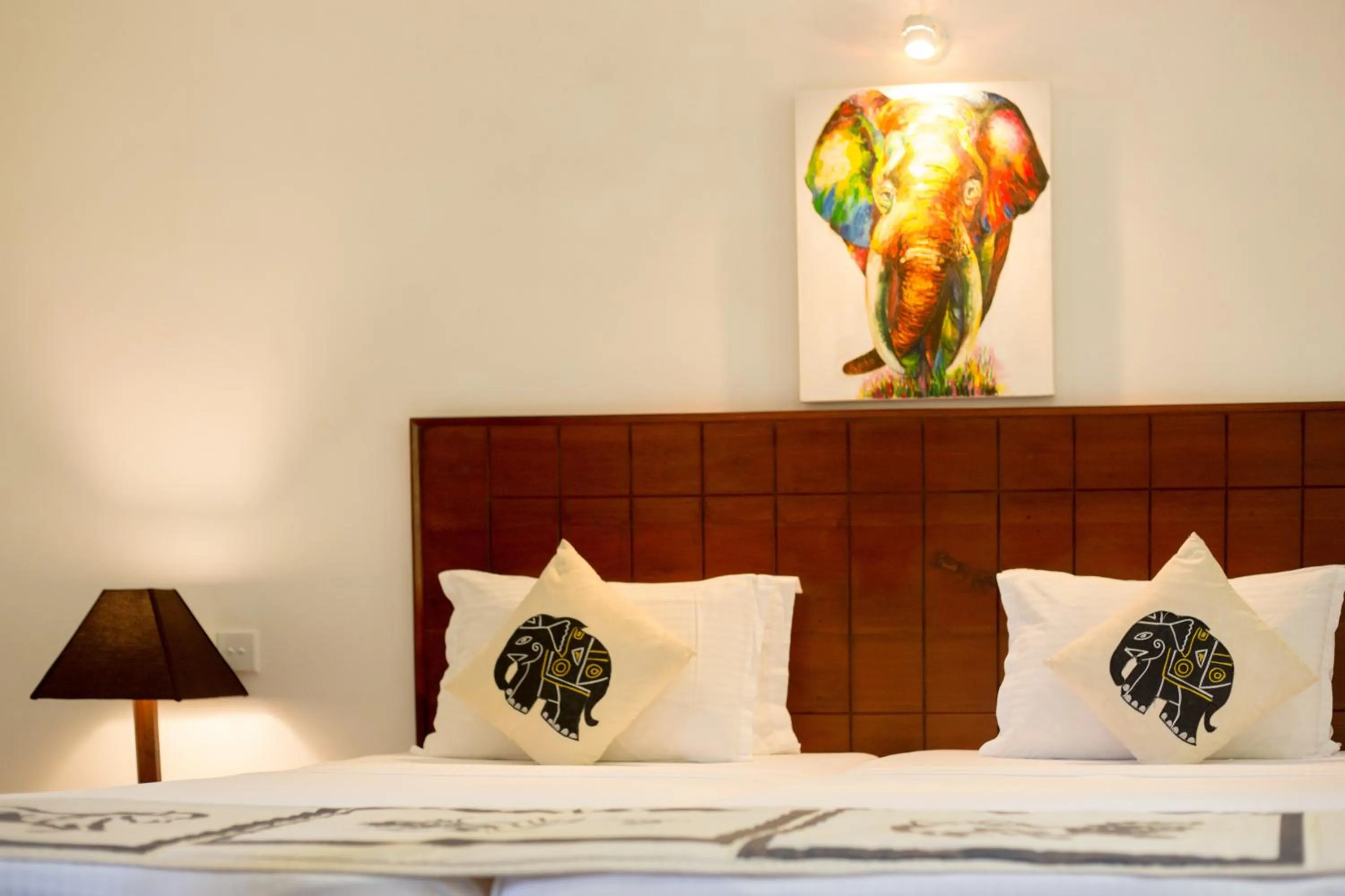 Bed in Camellia Resort And Spa