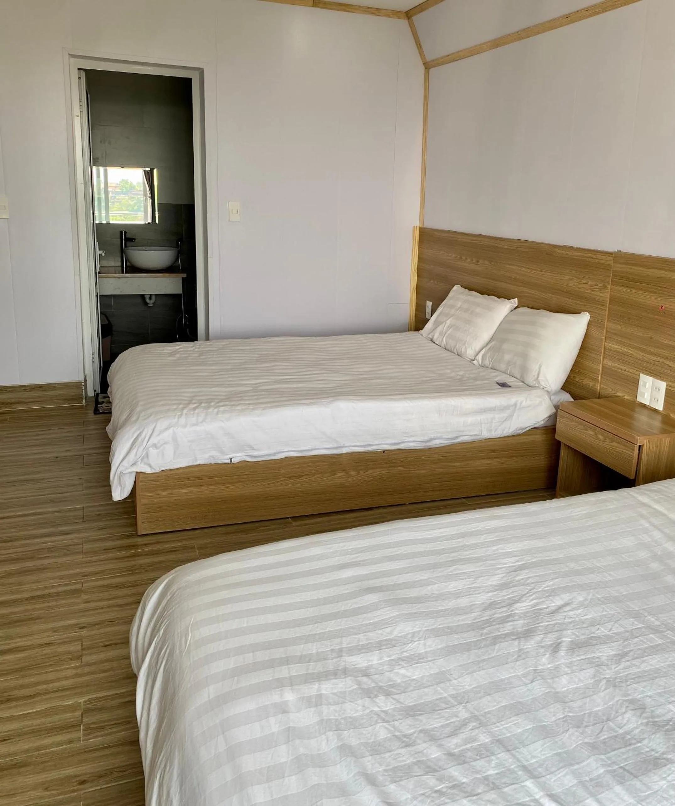 Photo of the whole room, Bed in Lacami Dalat Hotel