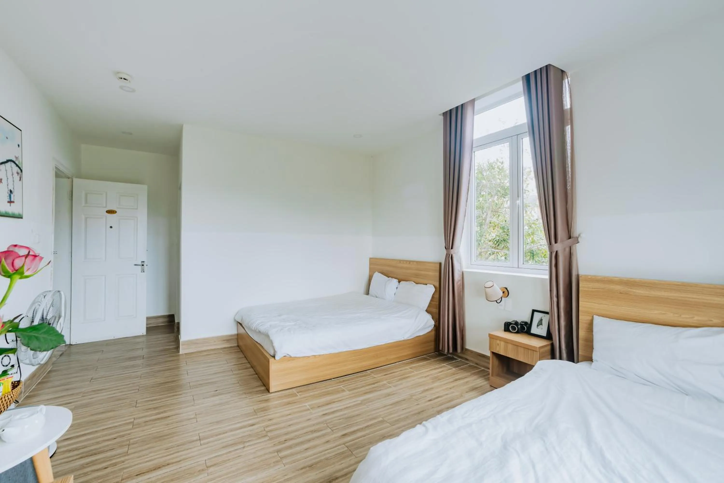 Bed in Lacami Dalat Hotel