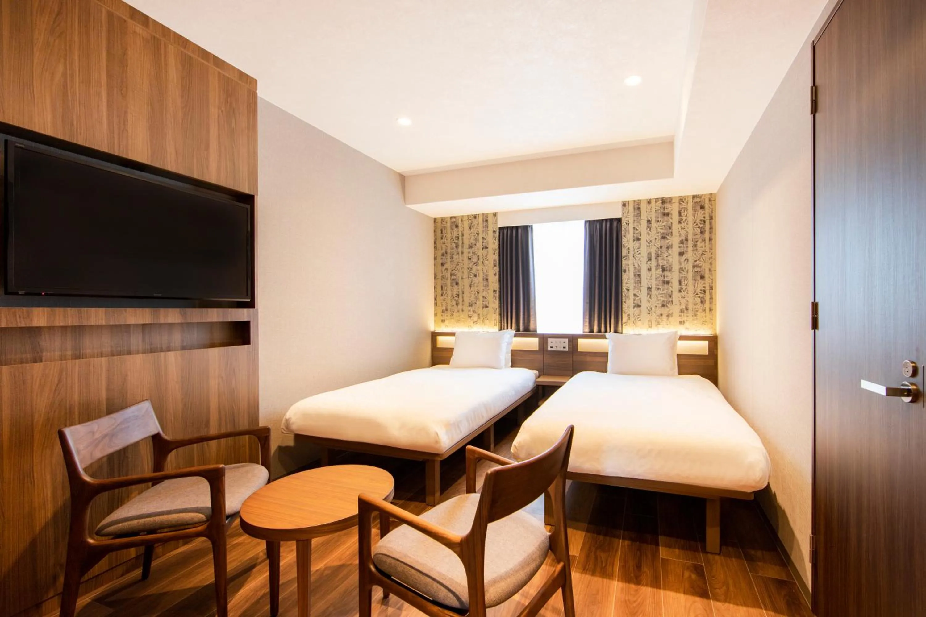 Photo of the whole room, Bed in karaksa hotel grande Shin-Osaka Tower