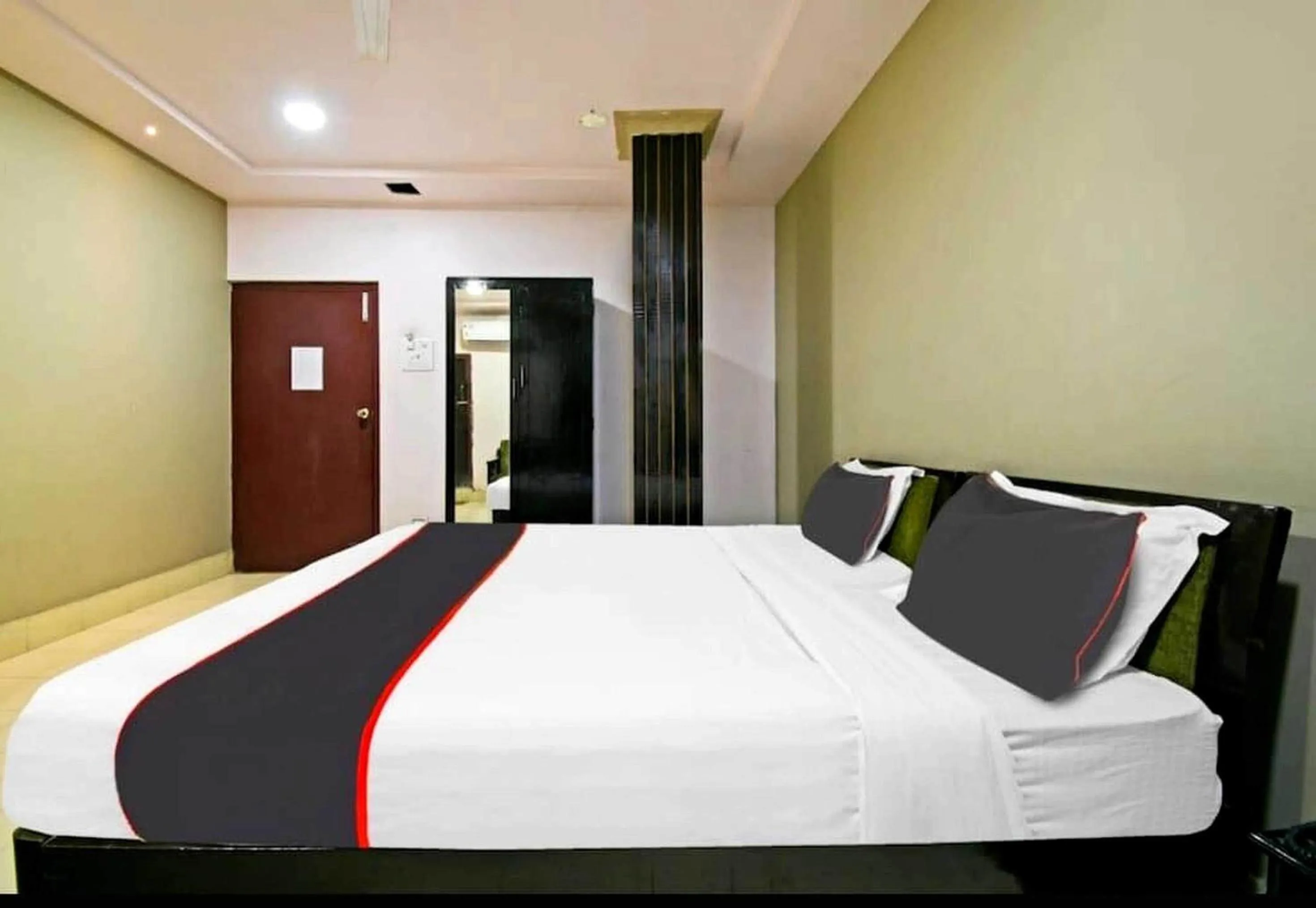 Bedroom in Collection O Megha Resort