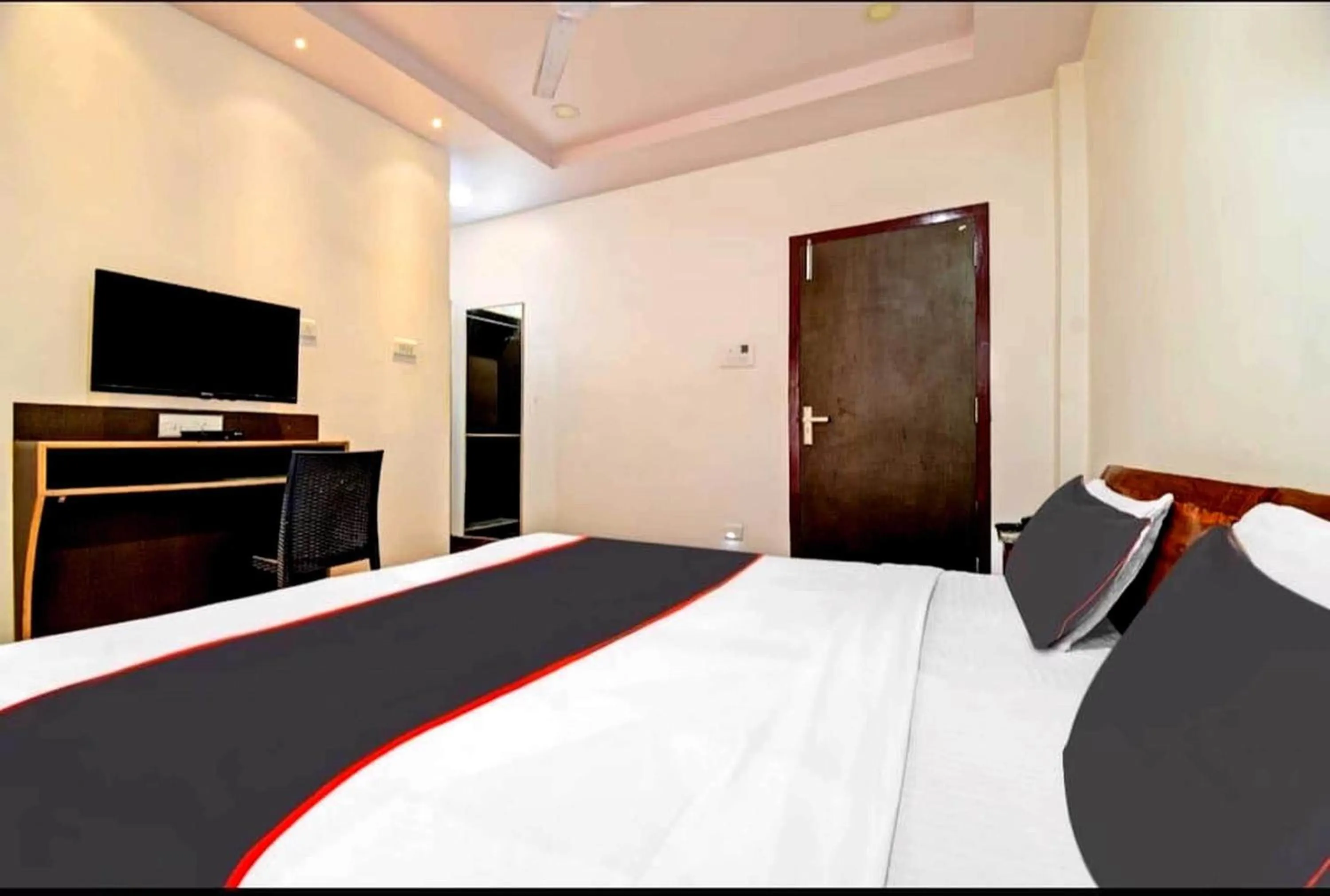 Bedroom in Collection O Megha Resort