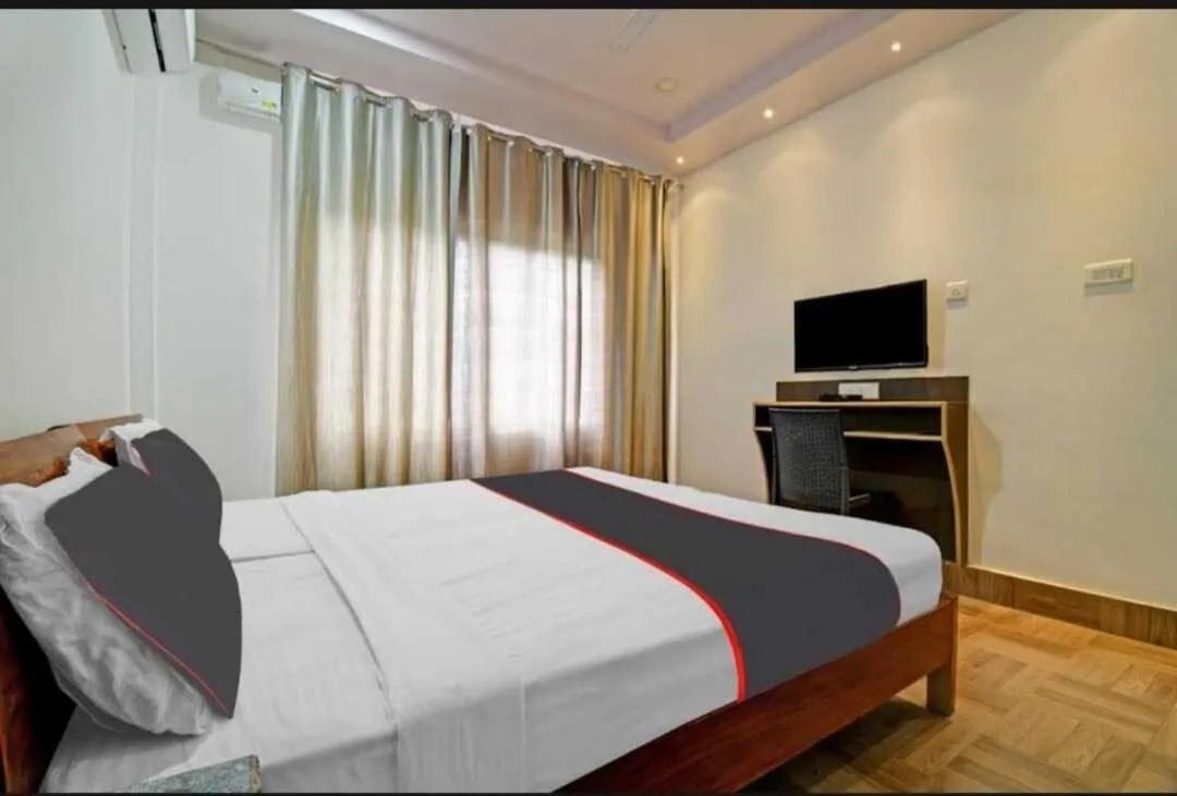 Bedroom in Collection O Megha Resort