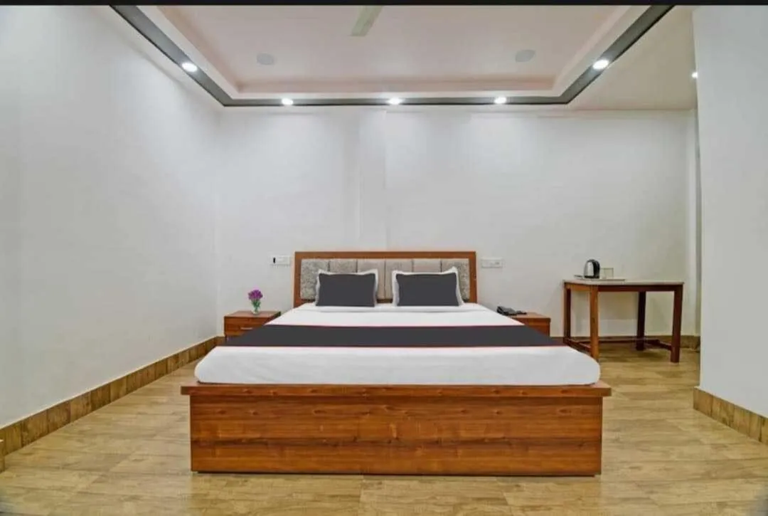 Bedroom in Collection O Megha Resort