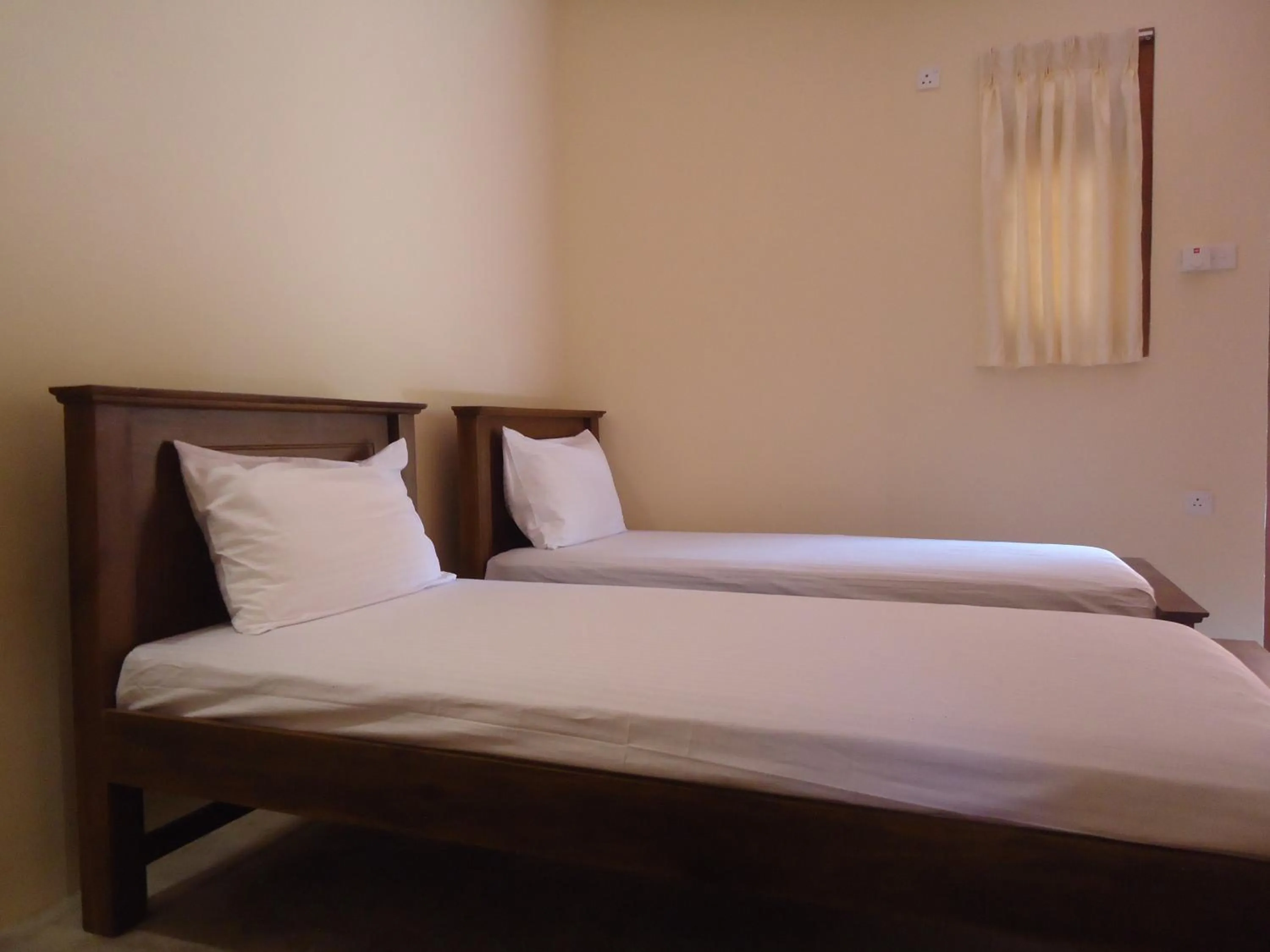 Photo of the whole room, Bed in New Sanmi Resort