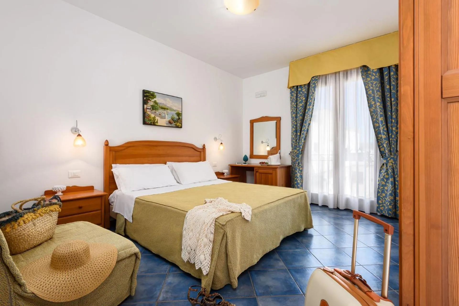 Bed in La Meridiana Hotel