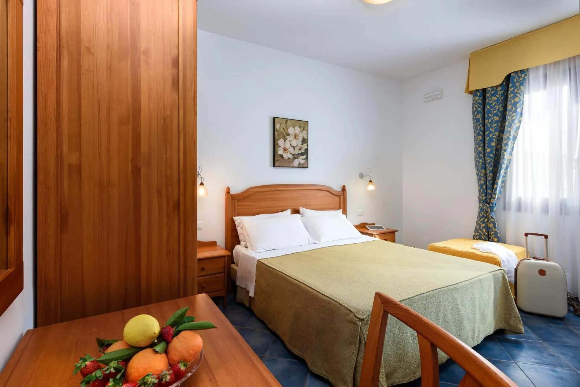 Bed in La Meridiana Hotel