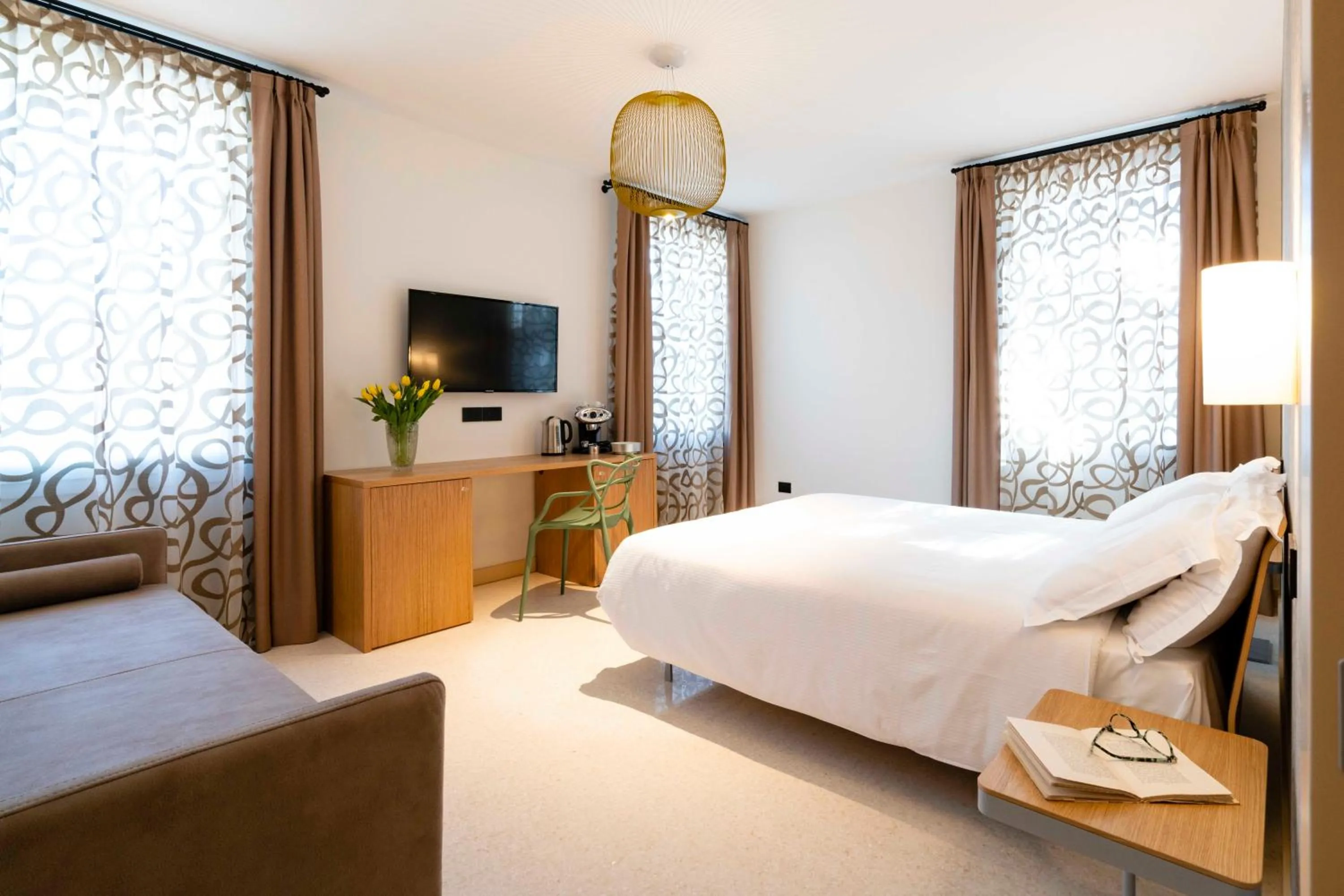 Bed in Antica Pusterla Relais de Charme