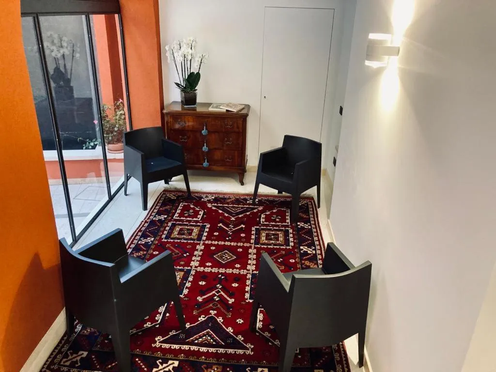 Communal lounge/ TV room in Antica Pusterla Relais de Charme