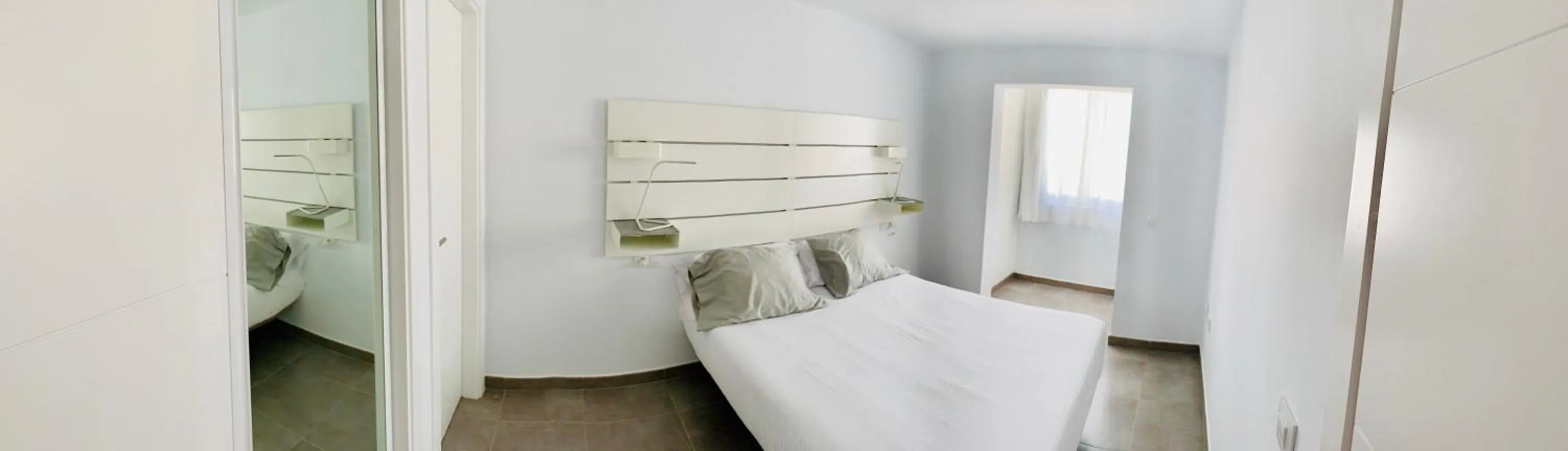 Bed in Apartamentos Zalabar