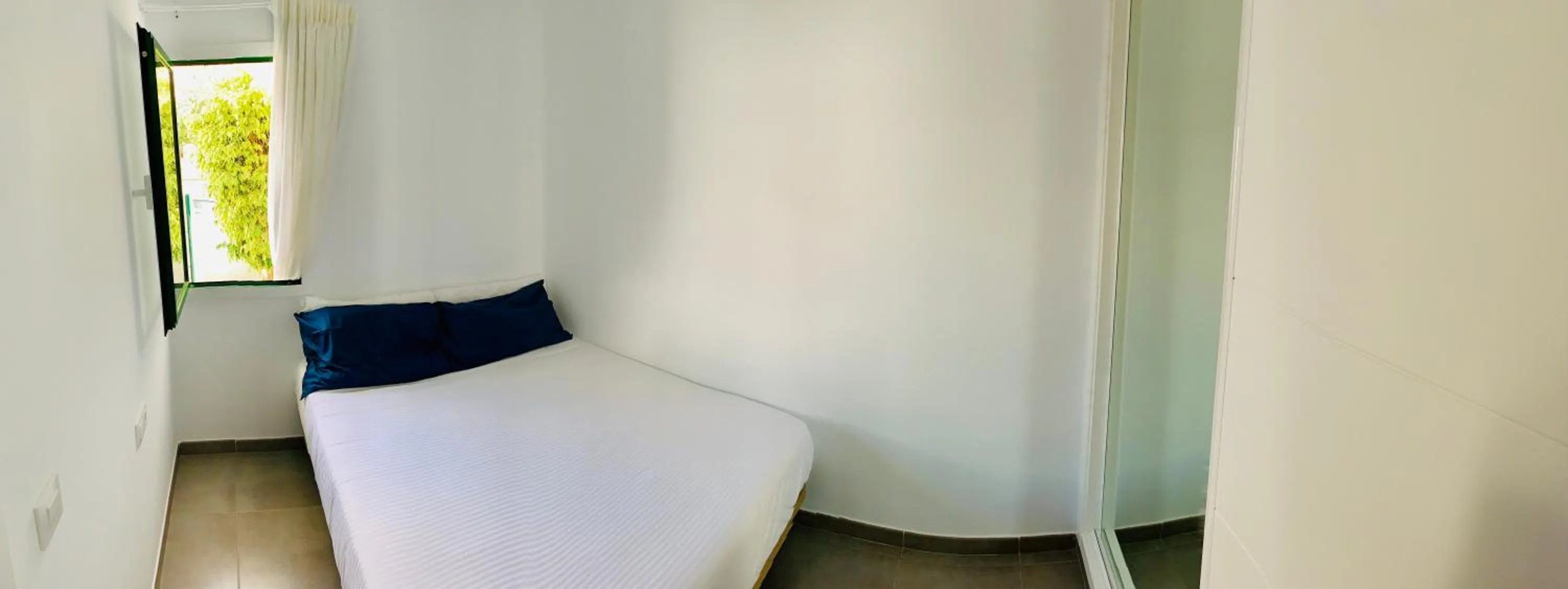 Bed in Apartamentos Zalabar