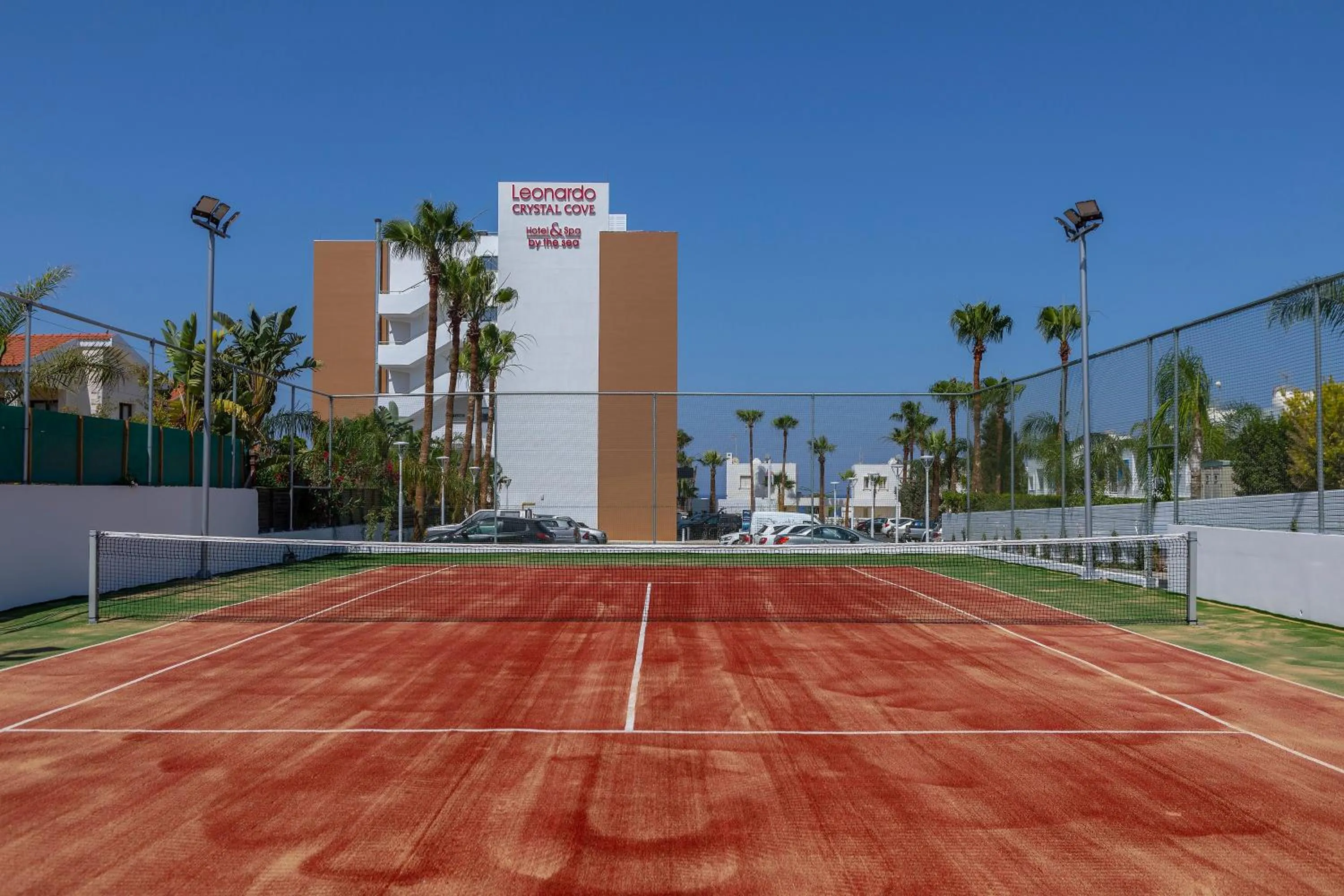 Tennis court in Leonardo Crystal Cove Hotel & Spa – Adults only