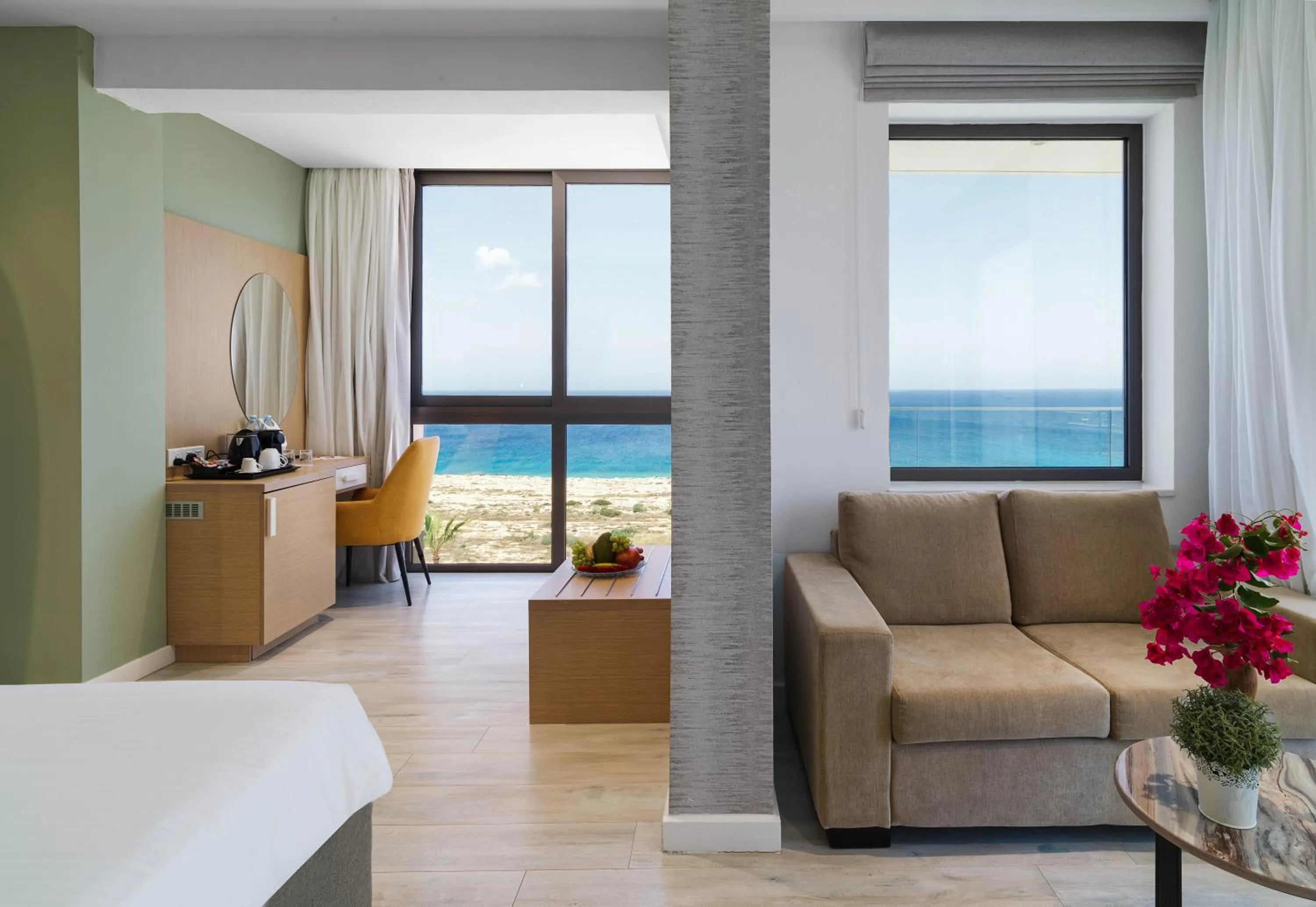 Seating area, Bed in Leonardo Crystal Cove Hotel & Spa – Adults only