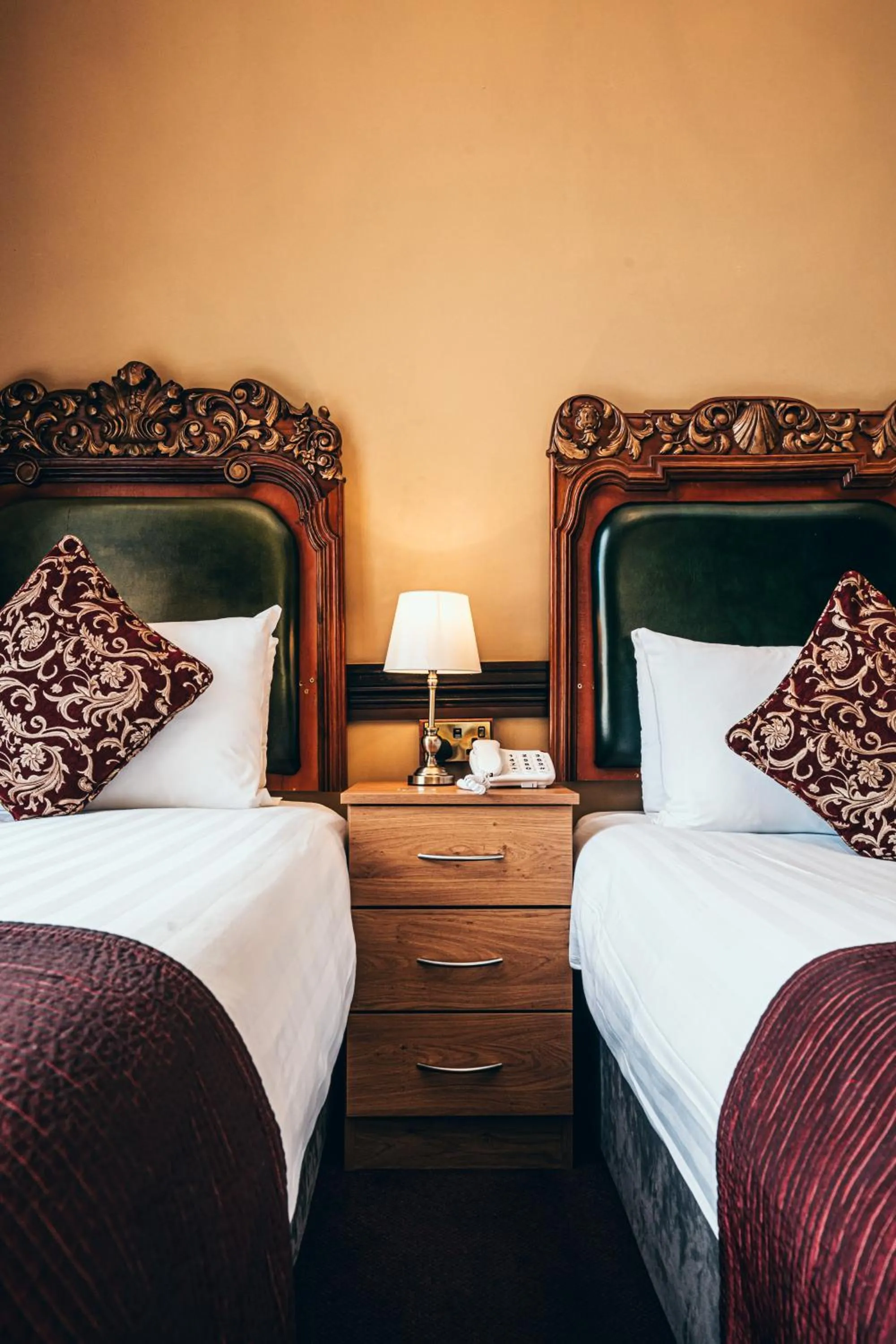 Bed in Russell Court Hotel