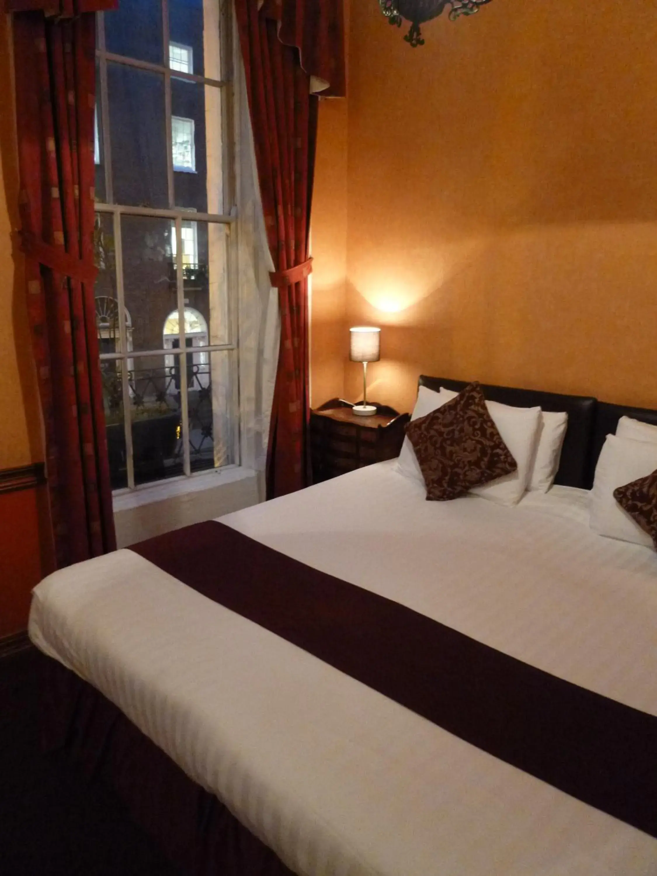 Bed in Russell Court Hotel Bed in Russell Court Hotel