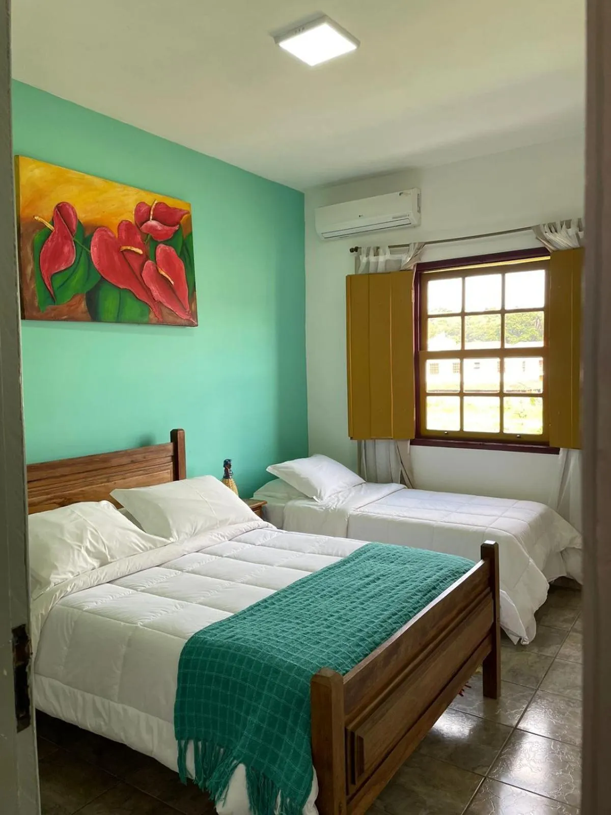 Bed in Pousada Neuza Barbosa