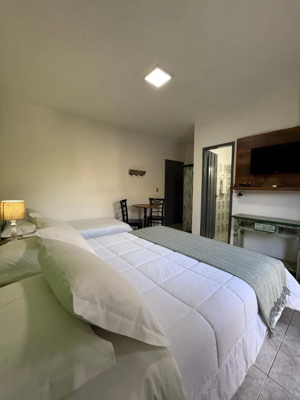 Bed in Pousada Neuza Barbosa