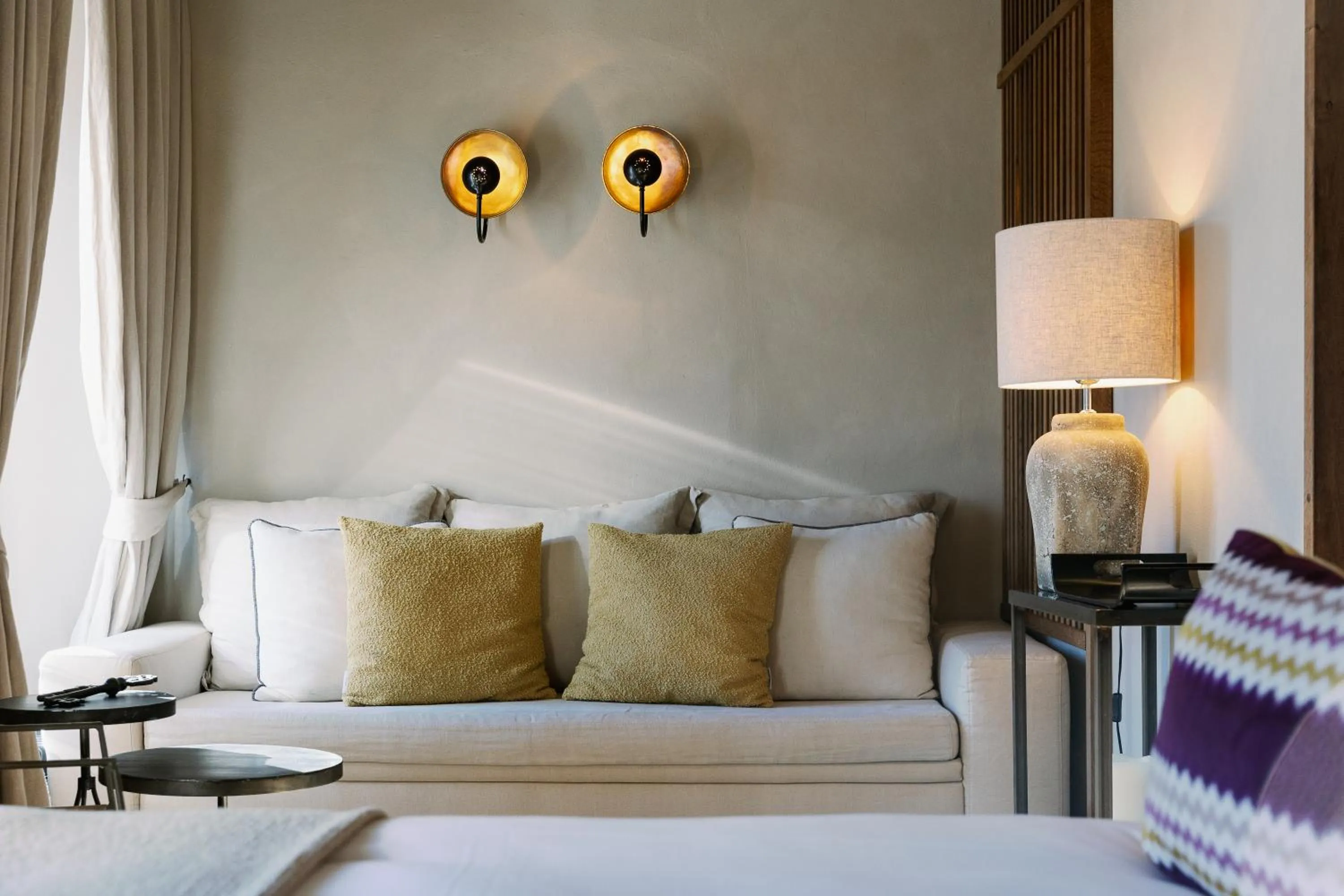 Seating area, Bed in Relais Castello di Morcote