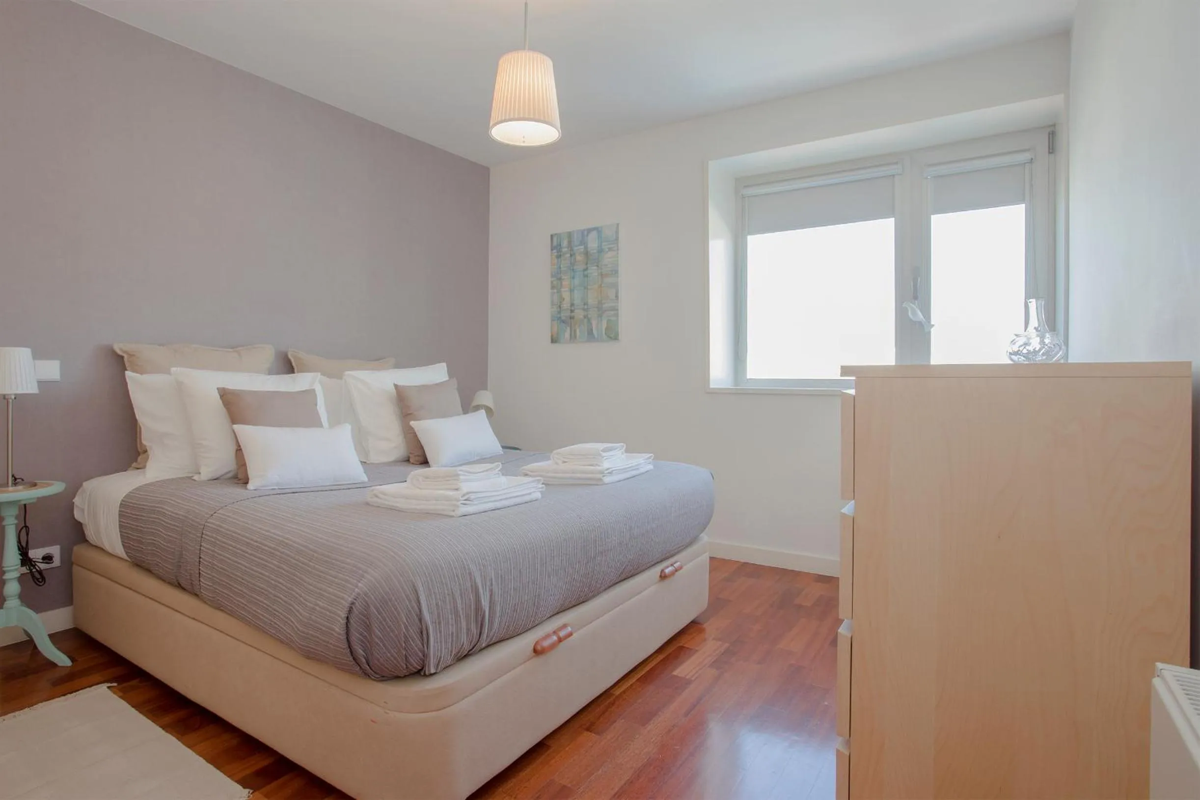 Bed in Liiiving in Porto | Bright Light Apartment