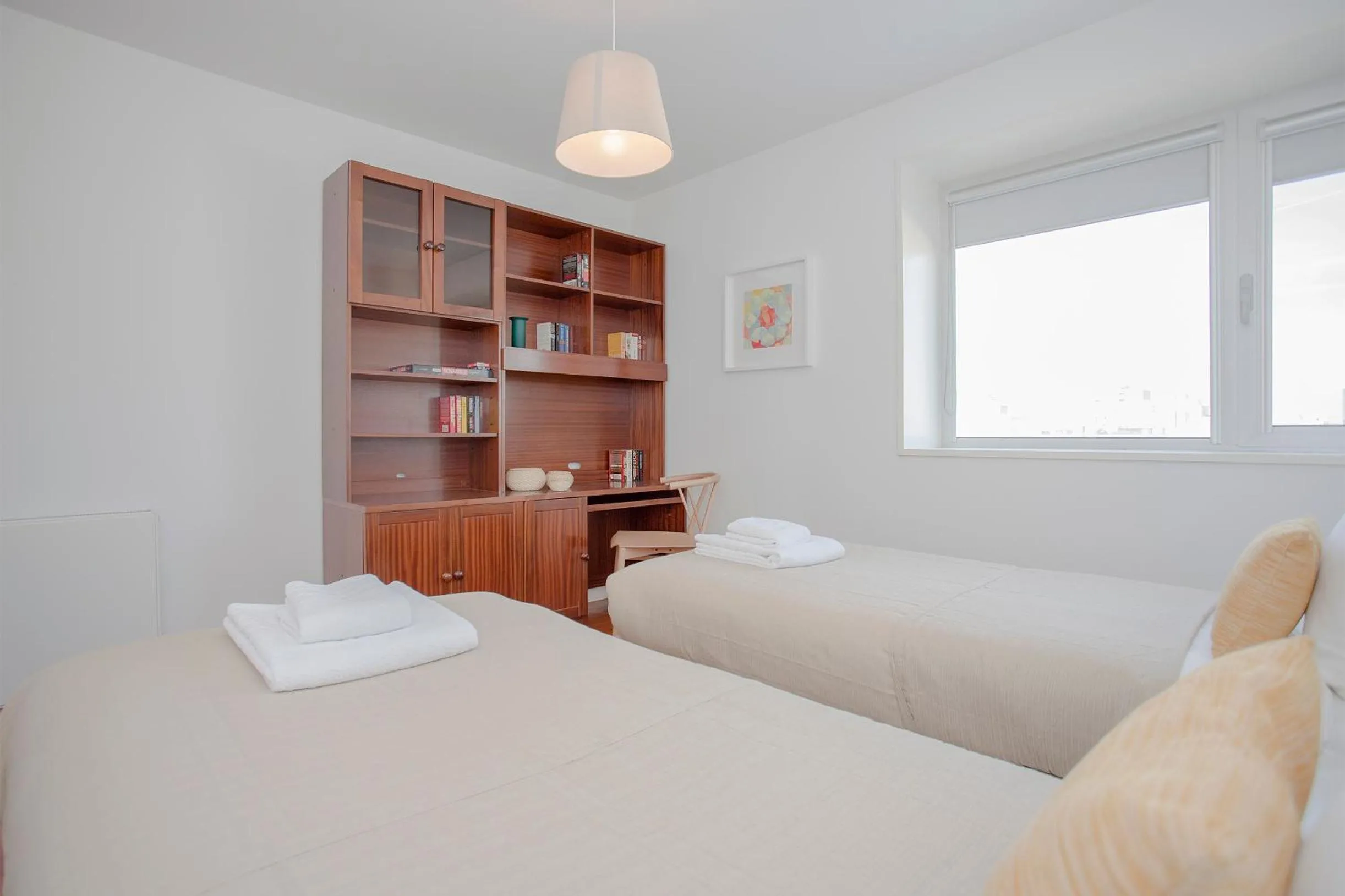 Bed in Liiiving in Porto | Bright Light Apartment