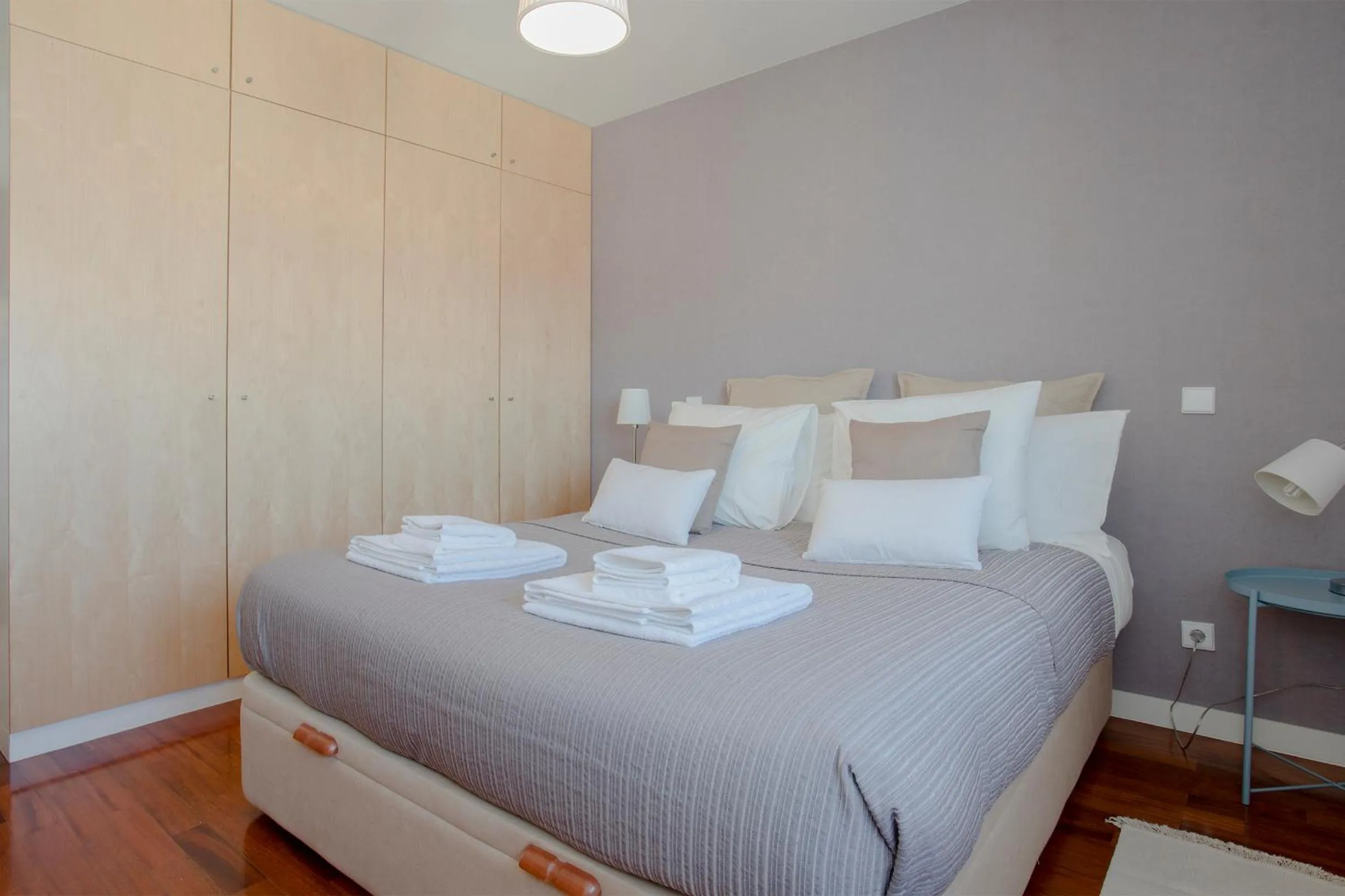 Bed in Liiiving in Porto | Bright Light Apartment