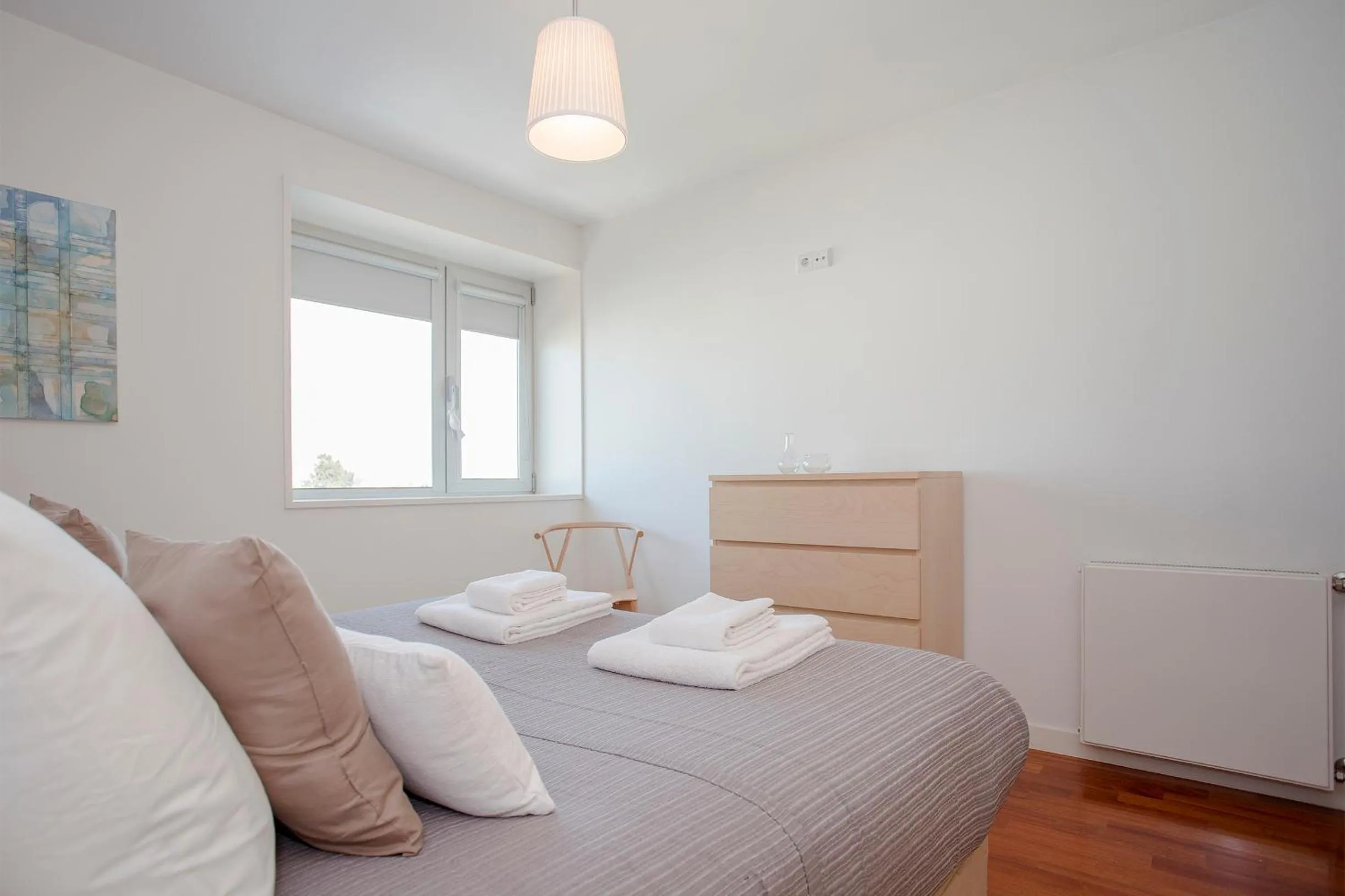 Bed in Liiiving in Porto | Bright Light Apartment