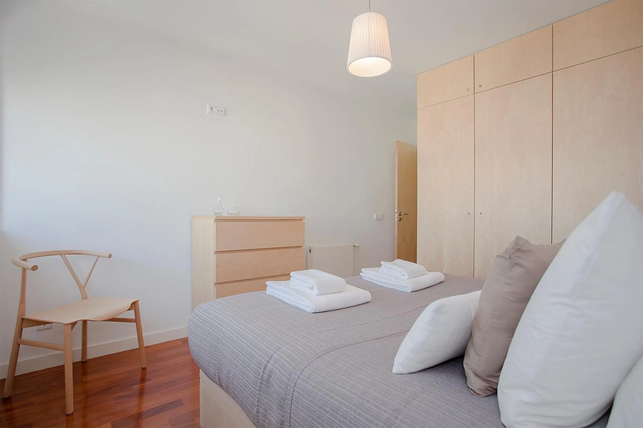 Bed in Liiiving in Porto | Bright Light Apartment