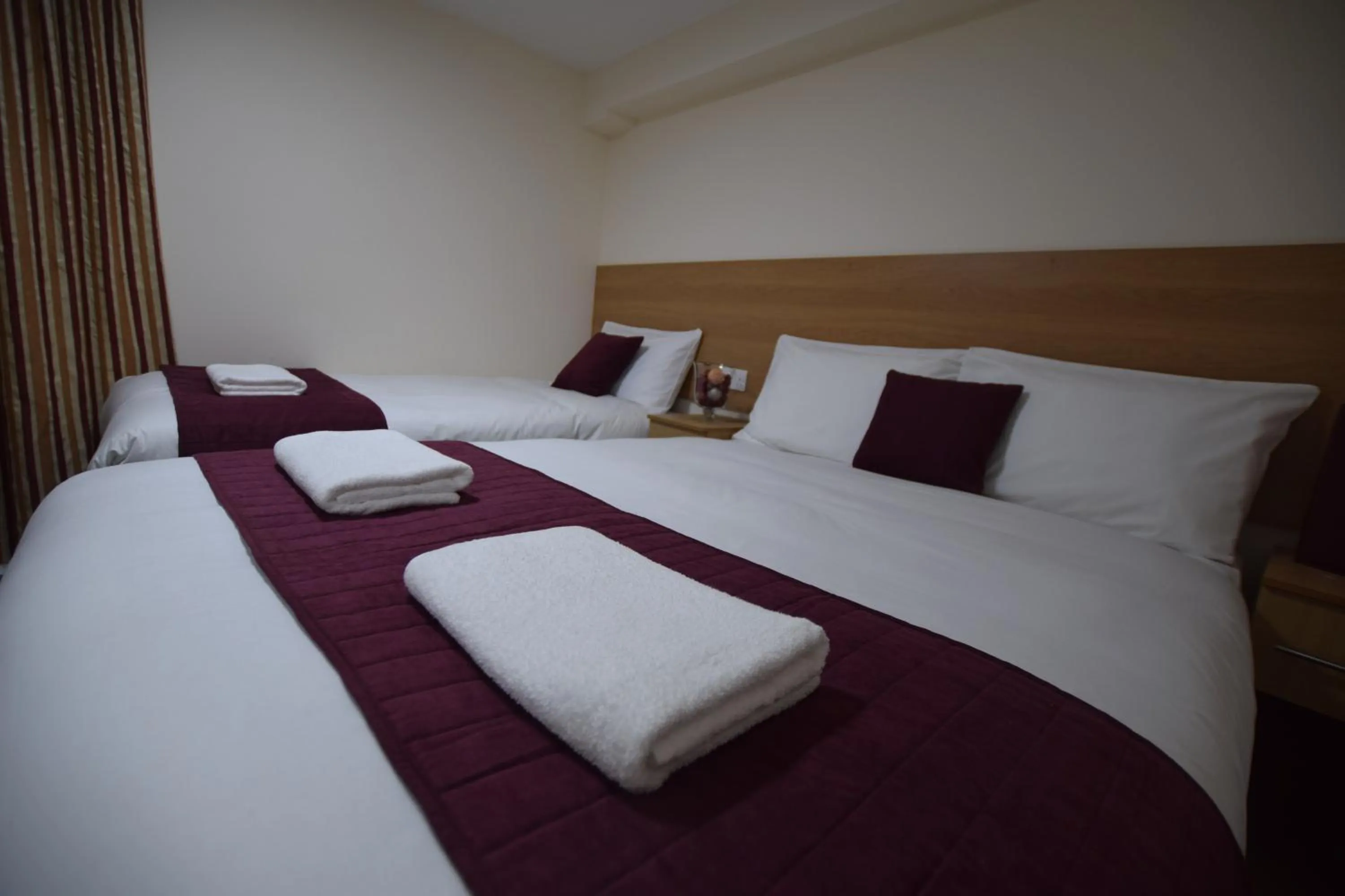 Bedroom, Bed in PremierLux Serviced Apartments
