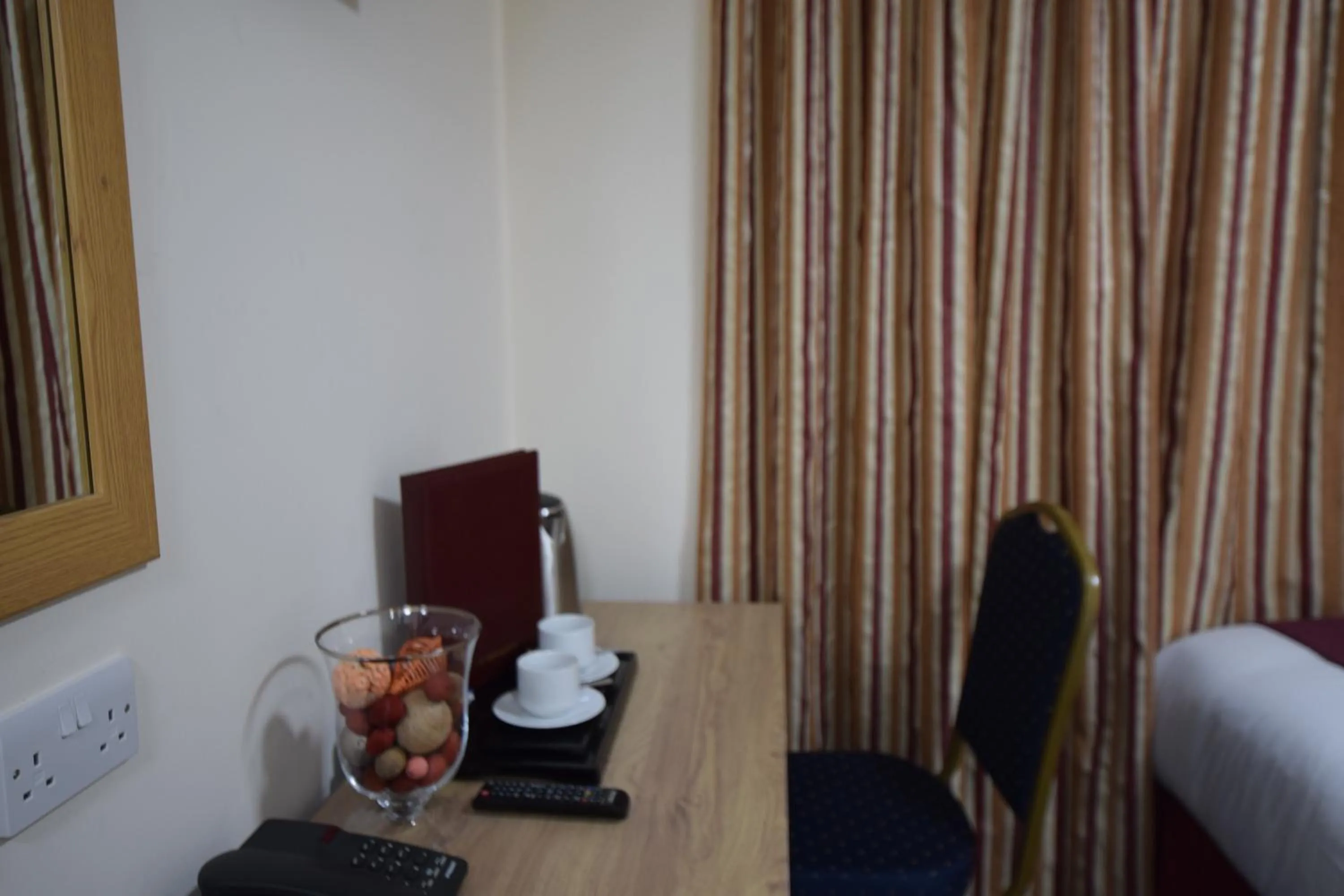 Coffee/tea facilities, Bed in PremierLux Serviced Apartments