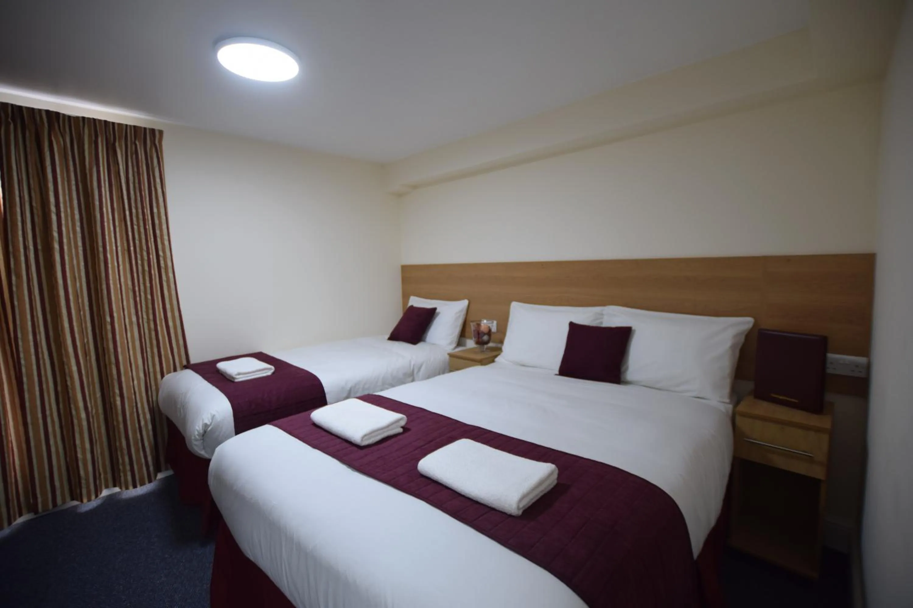 Bedroom, Bed in PremierLux Serviced Apartments