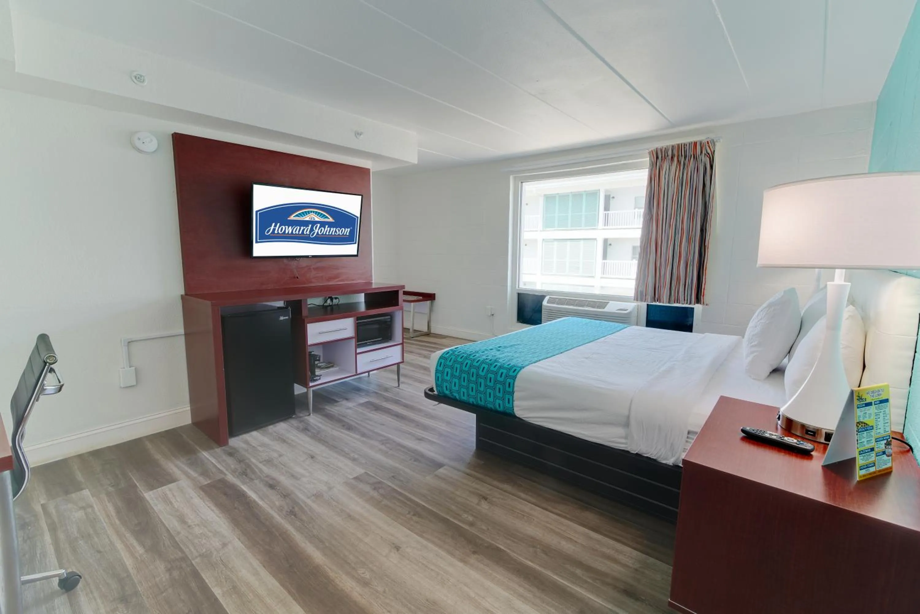 Bed in Howard Johnson by Wyndham Virginia Beach At The Beach