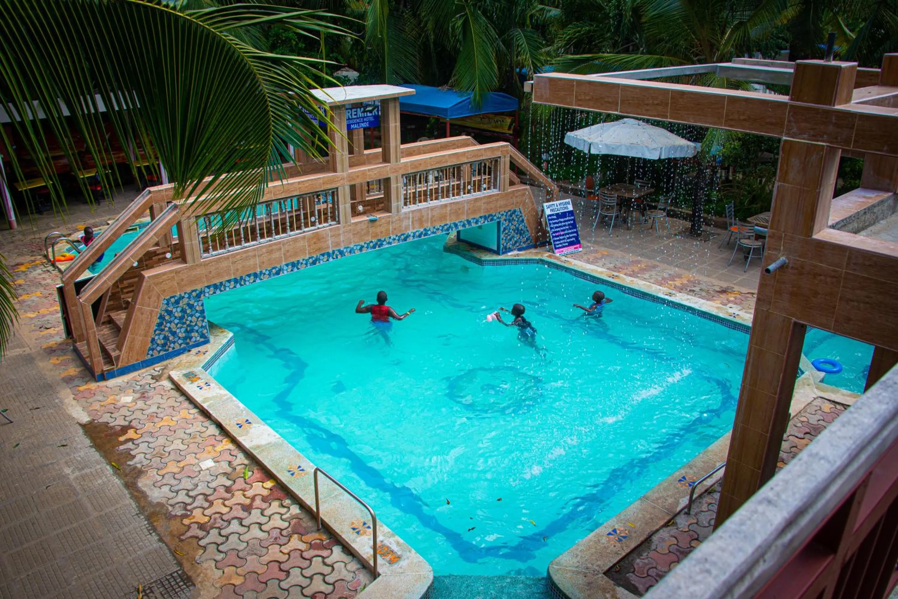 Swimming pool in Premier Guest Residence Hotel
