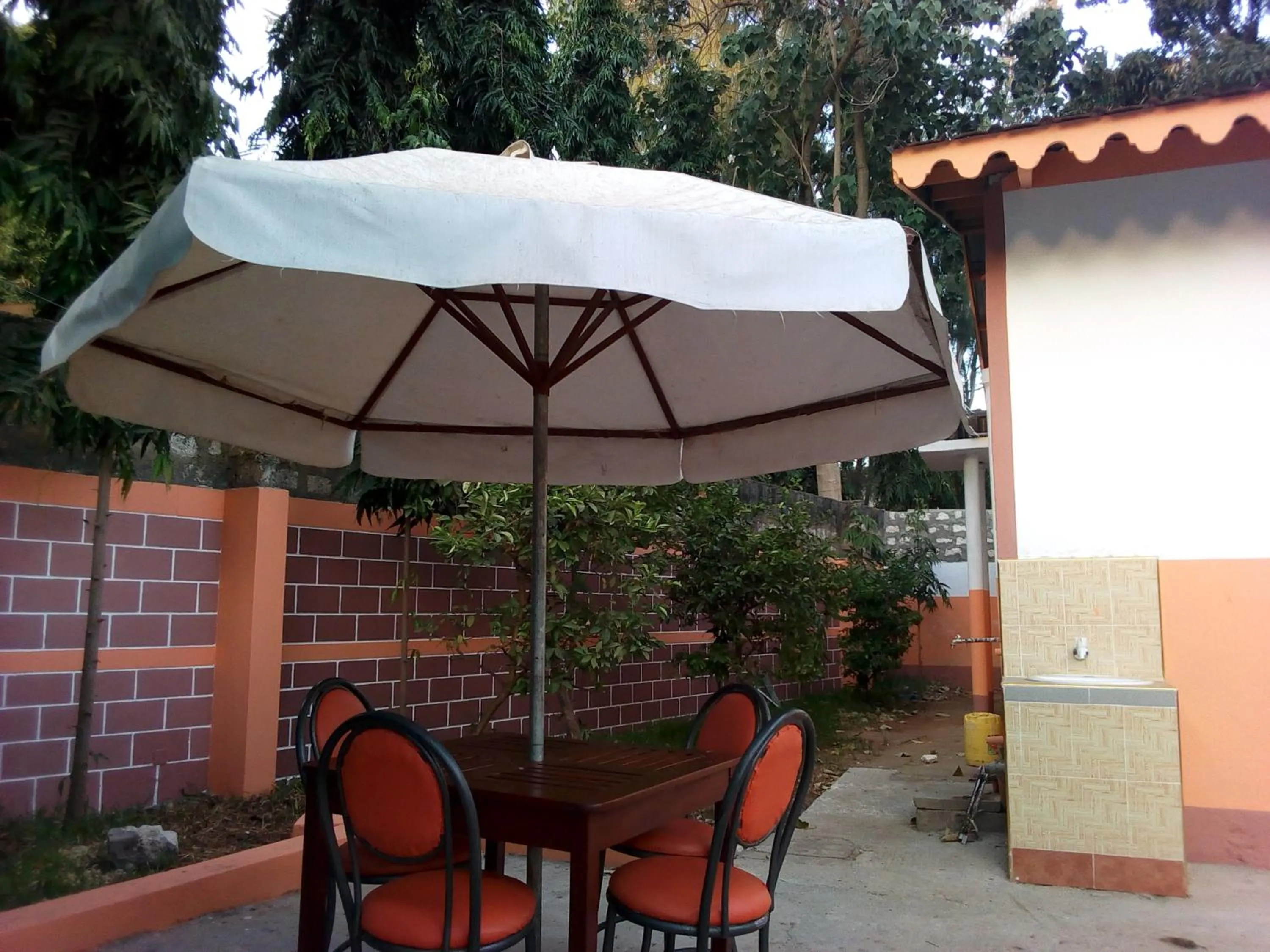 Patio in Premier Guest Residence Hotel