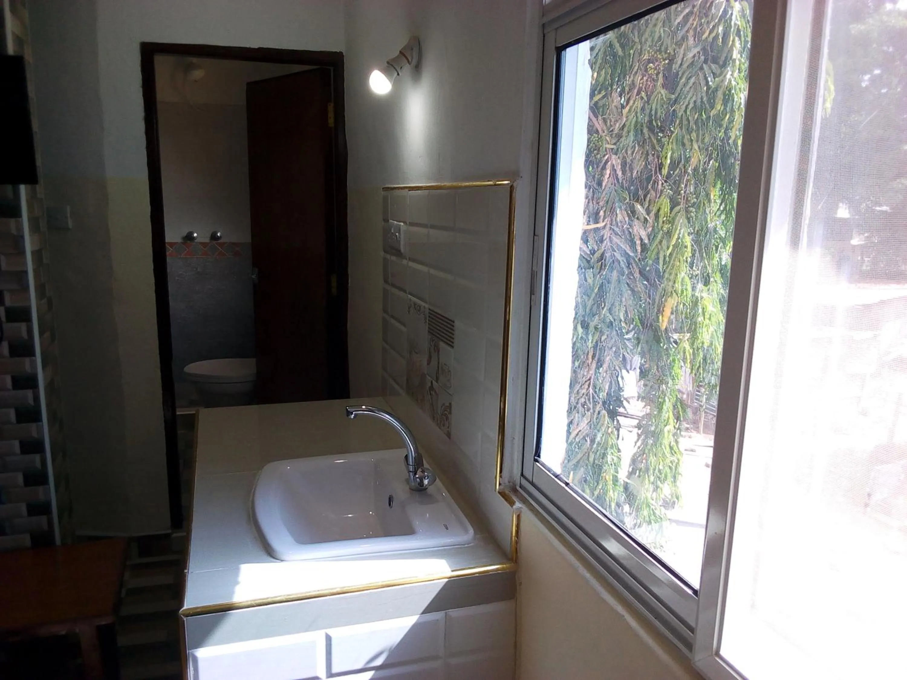 Bed in Premier Guest Residence Hotel