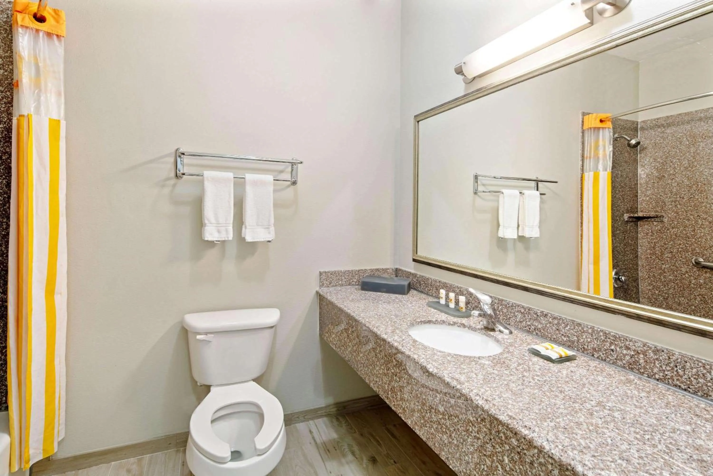 Toilet in La Quinta Inn & Suites by Wyndham Mercedes Outlet Mall
