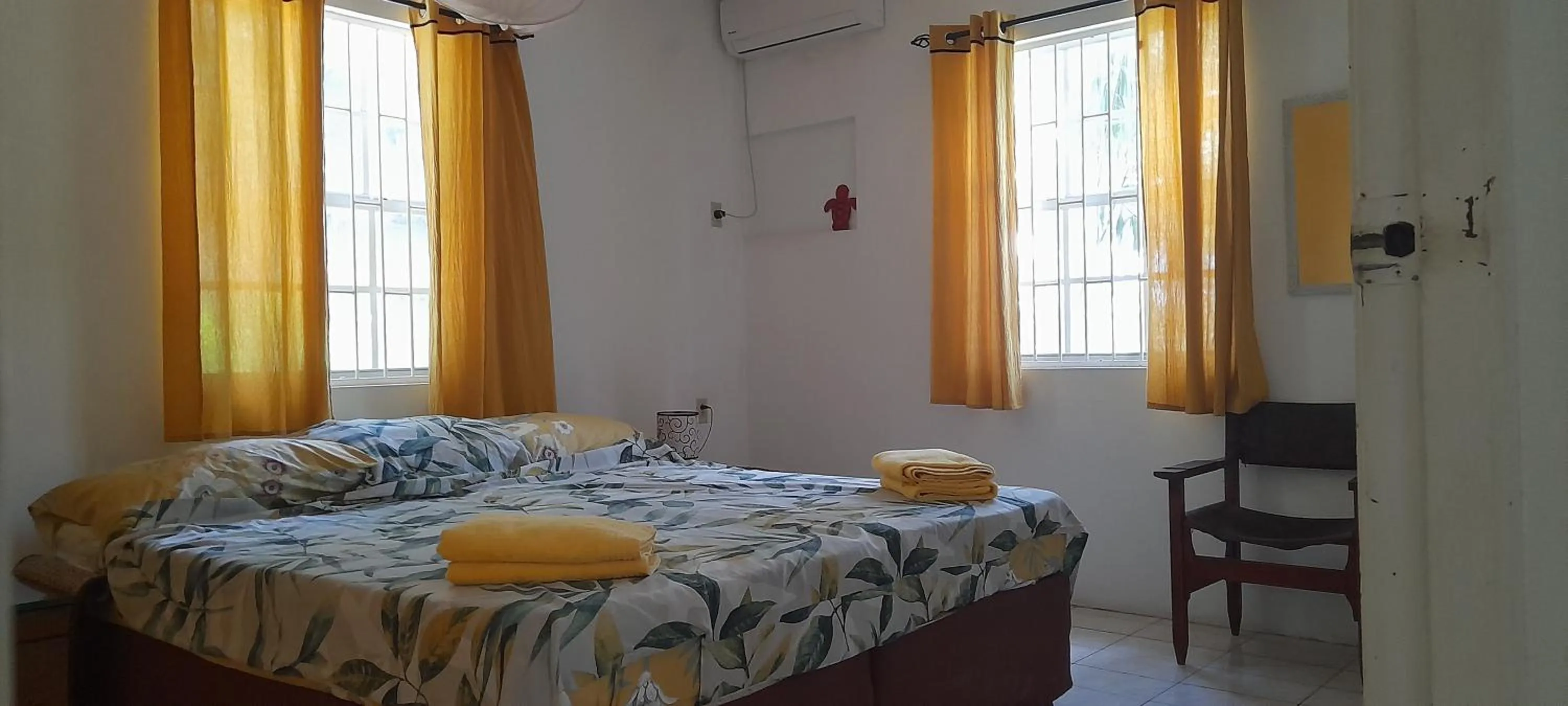 Bed in Happy Turtle Apartments