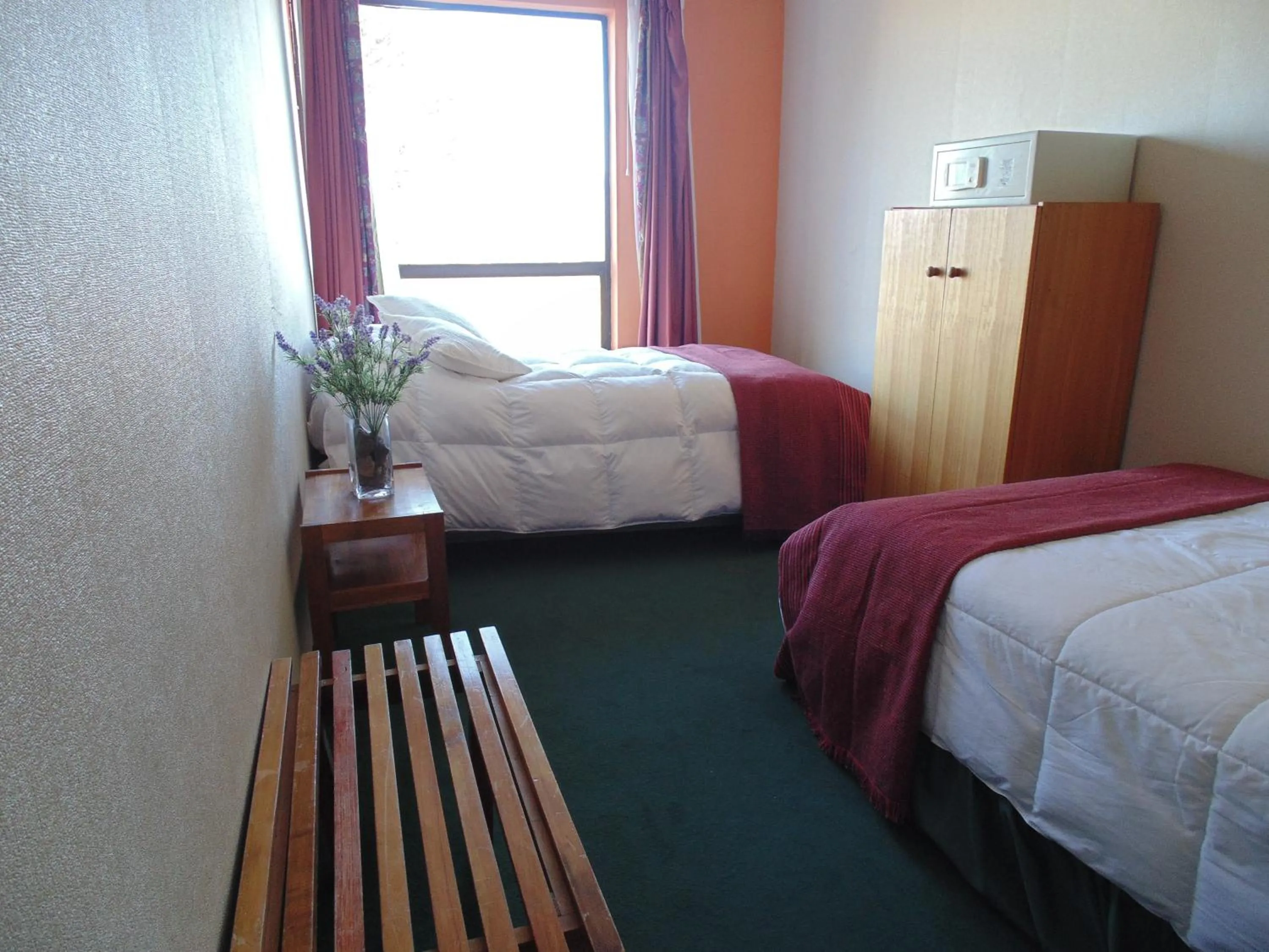 Bed in Hotel HD Natales