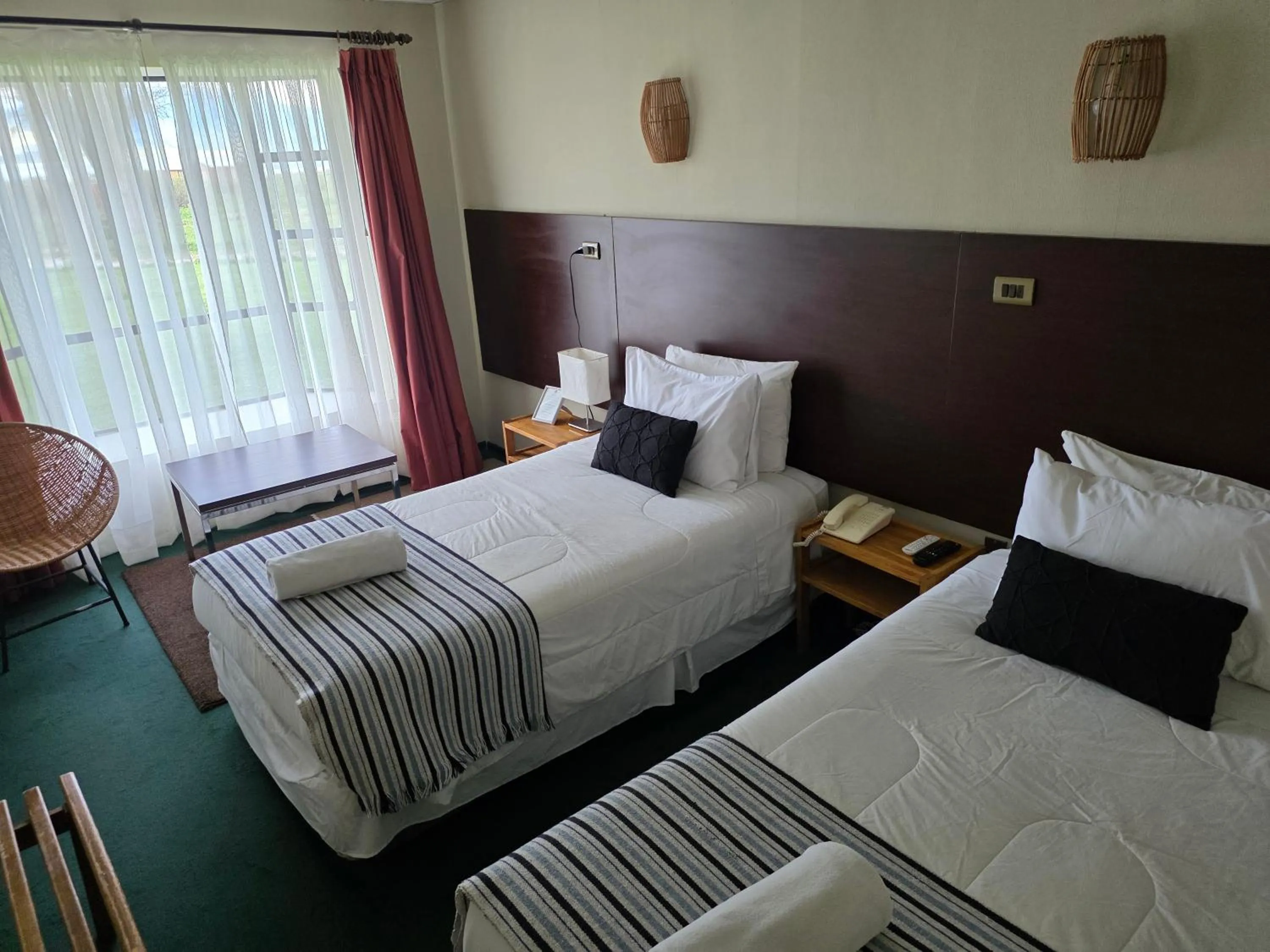 Bed in Hotel HD Natales