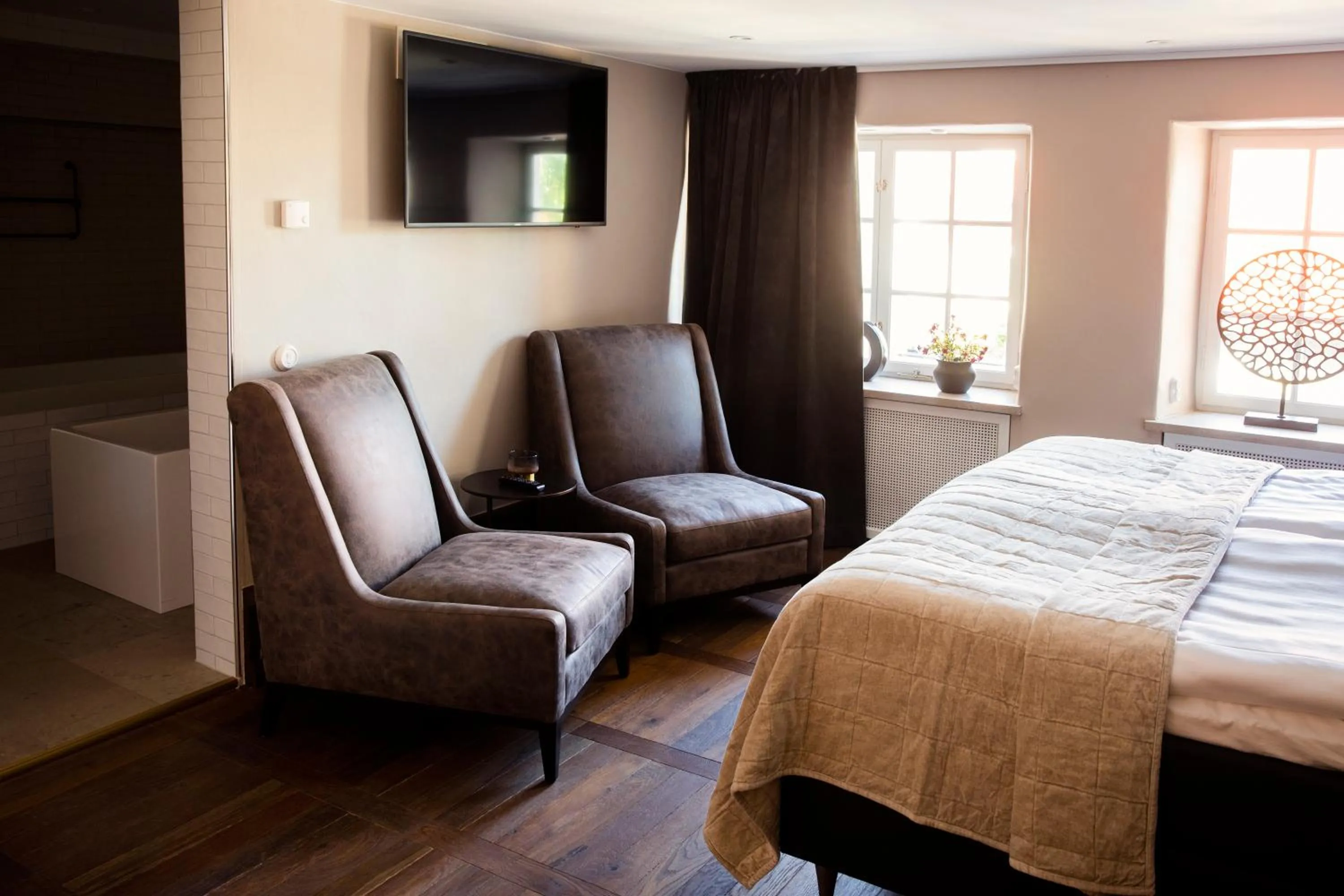 Seating area, Bed in Hotell Visby Börs