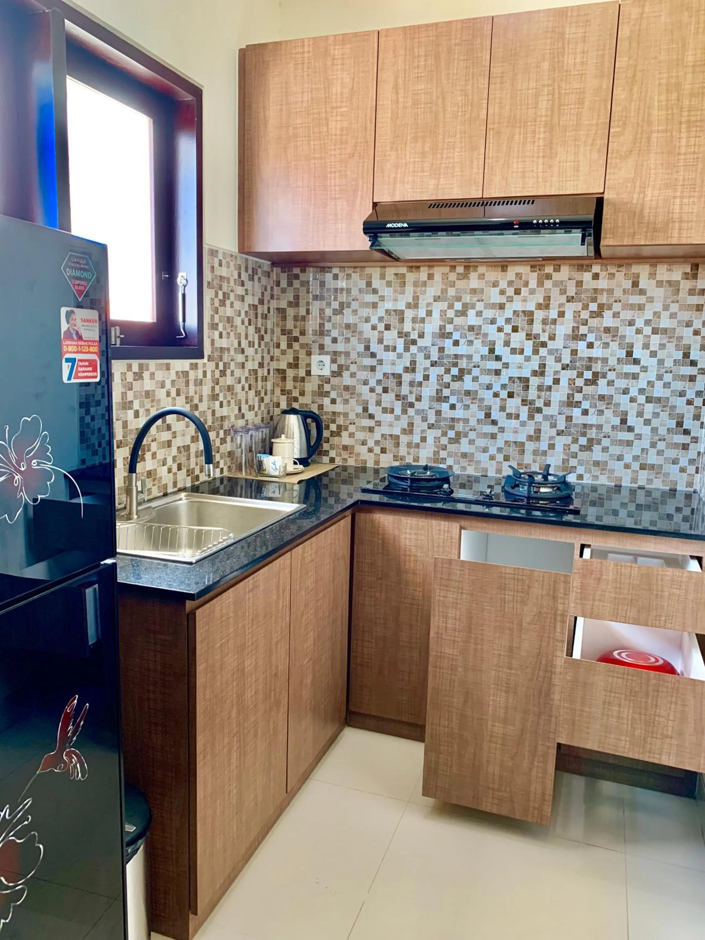 Kitchen or kitchenette in Jonsen Homestay