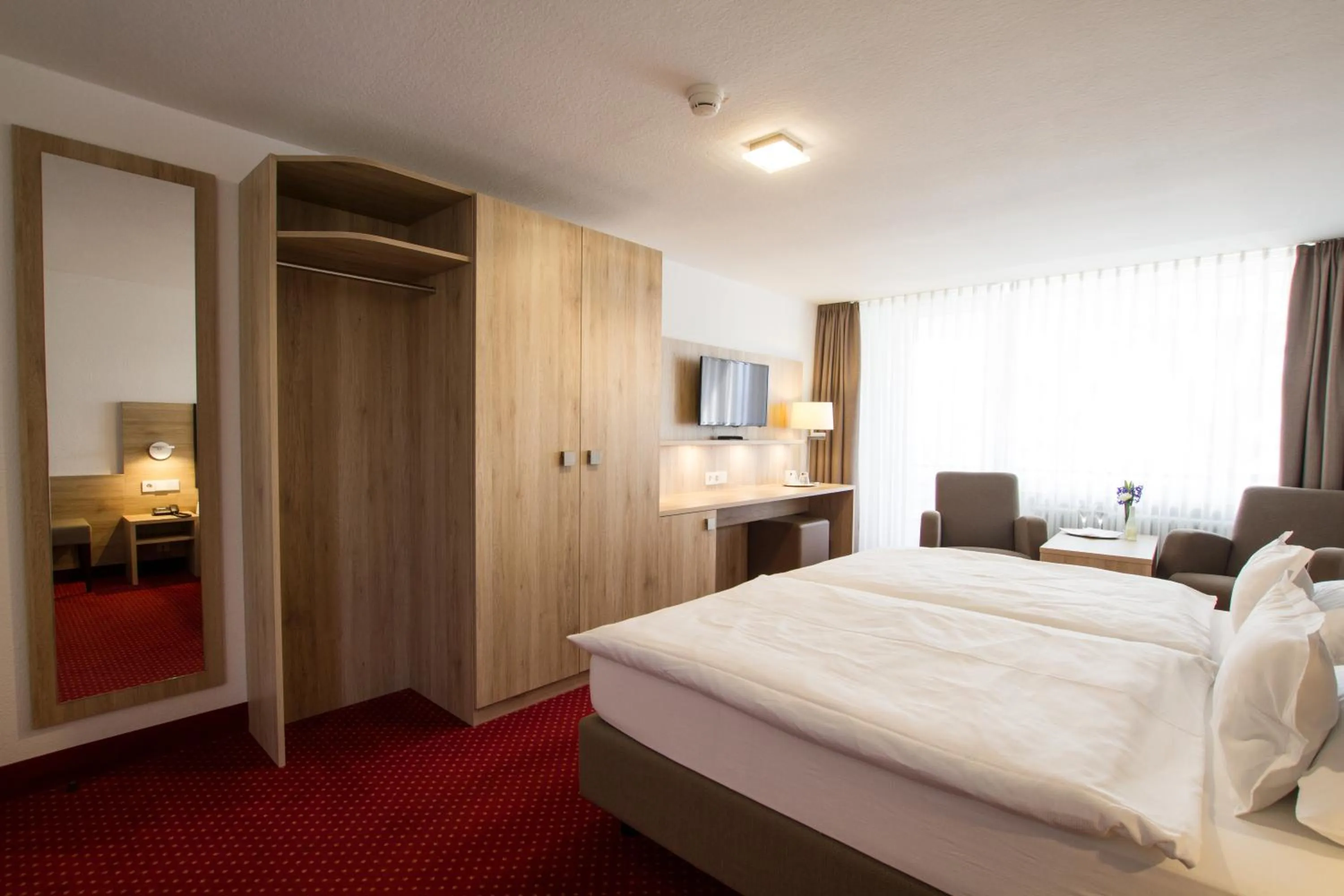Photo of the whole room, Bed in Hotel Seepark Garni