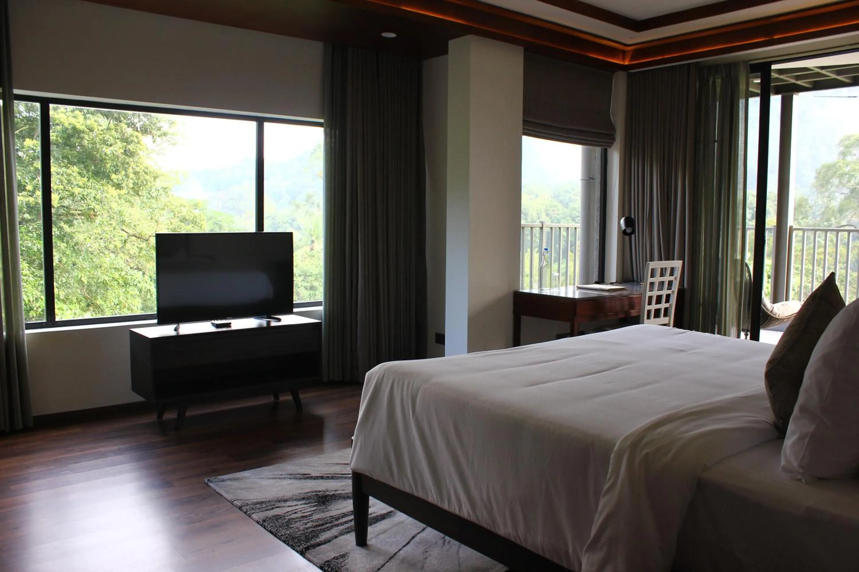 TV and multimedia, Bed in Niraamaya Retreats Samroha Athirappilly