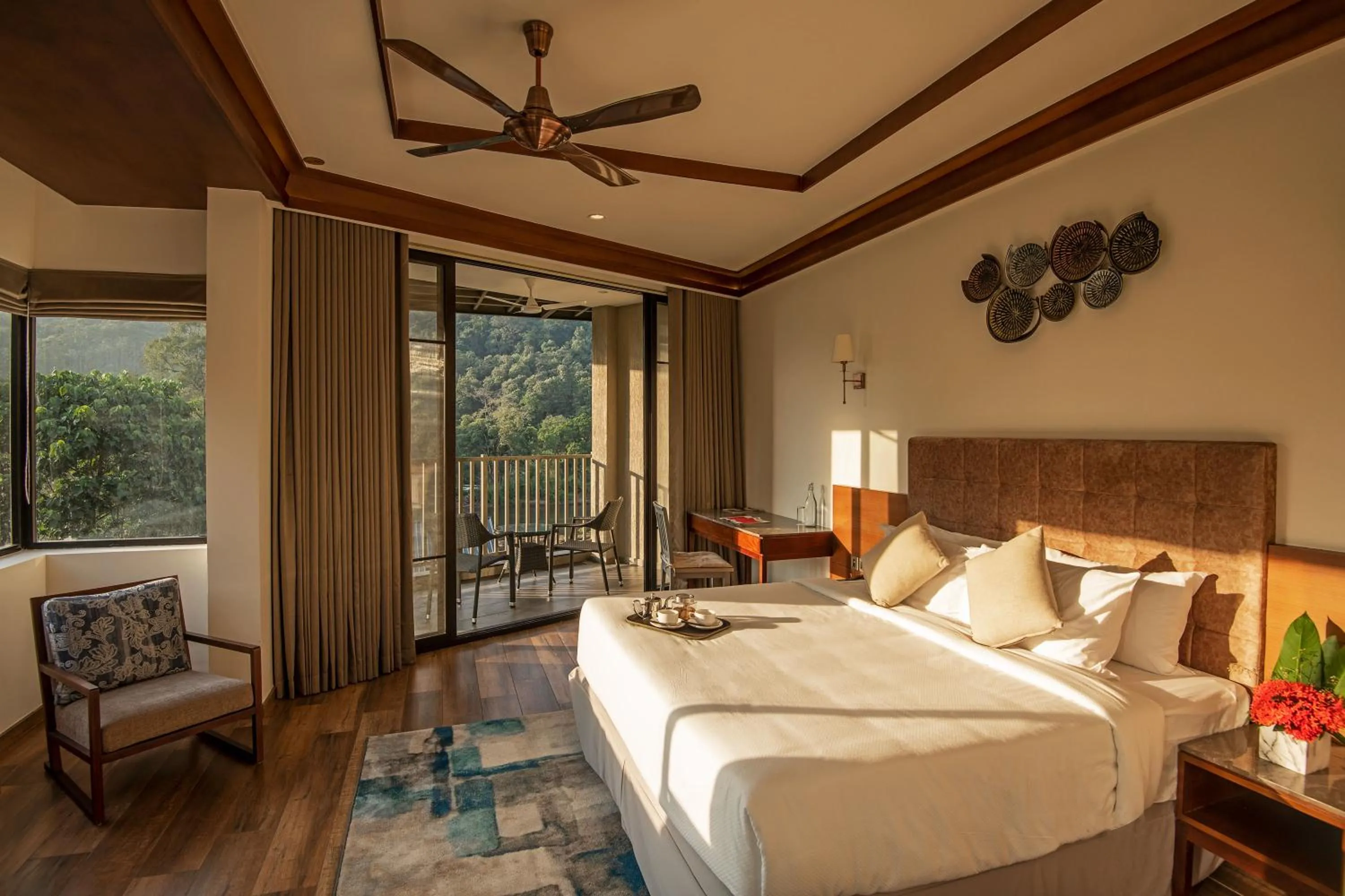 Photo of the whole room, Bed in Niraamaya Retreats Samroha Athirappilly