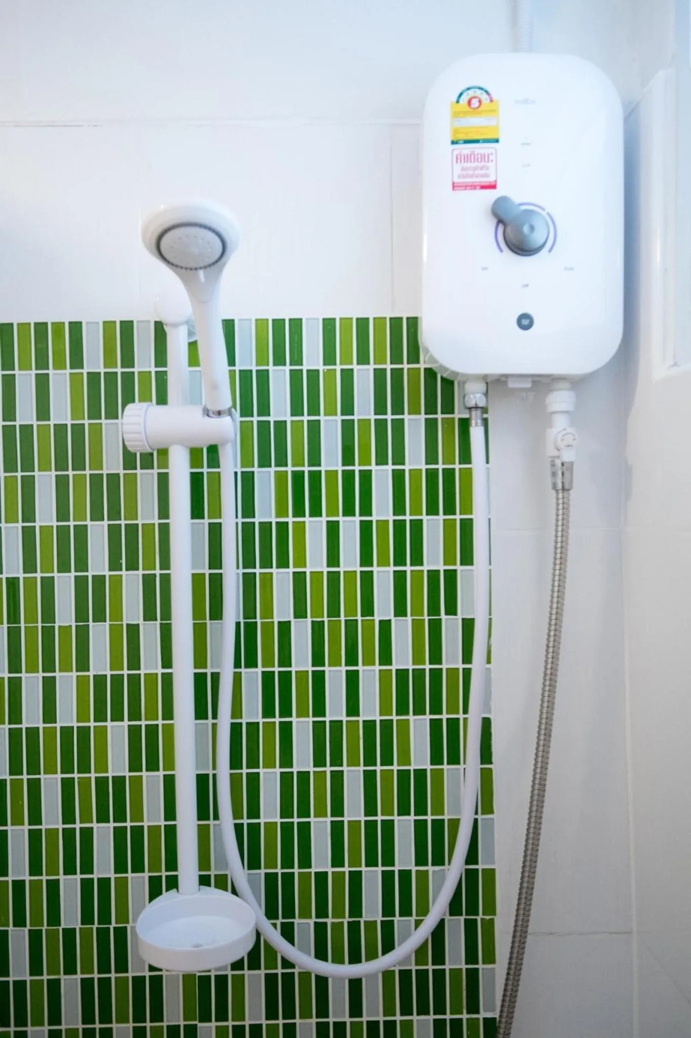 Shower in Malizon Hotel and Residences