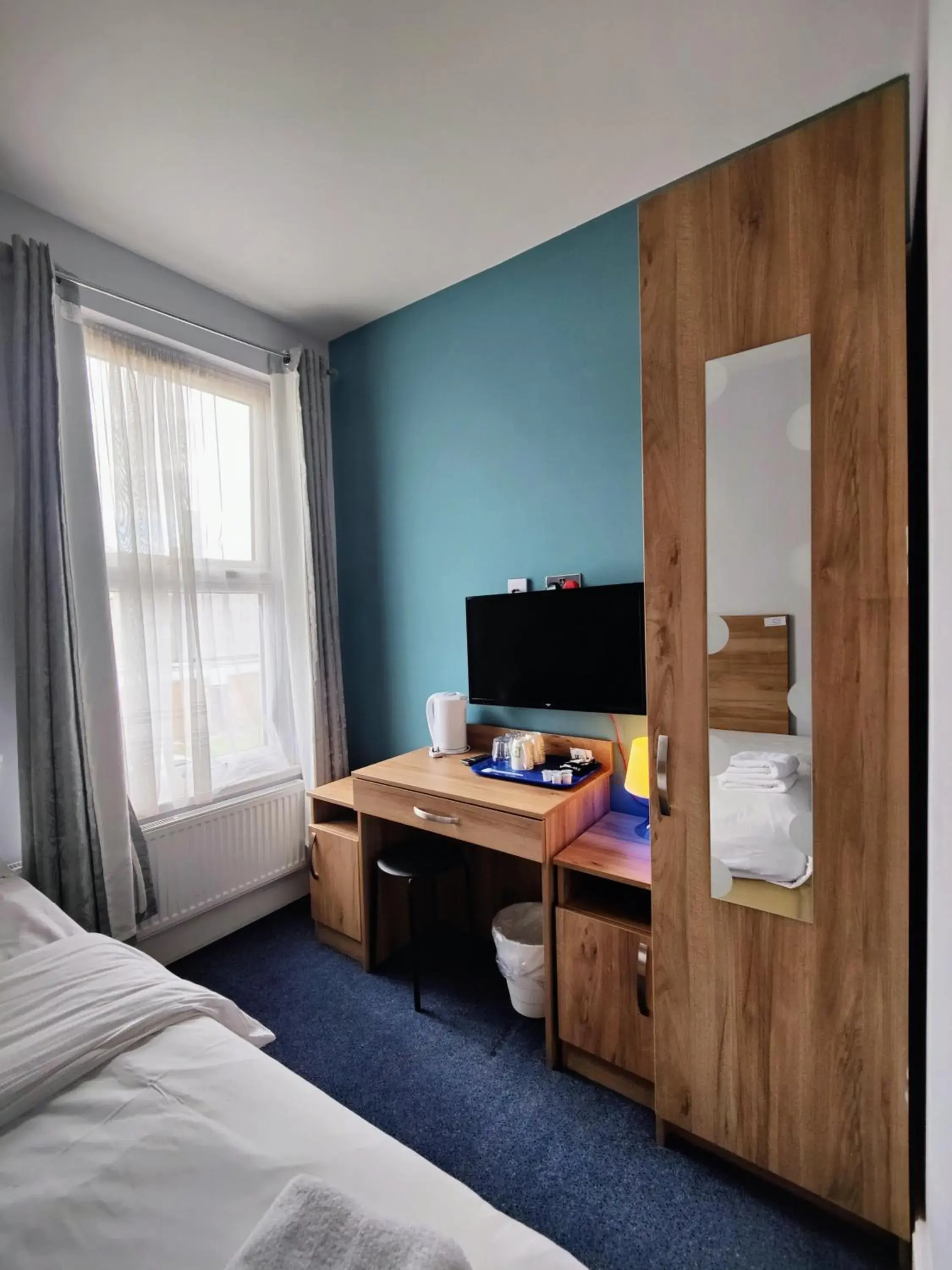 Bed in Wellesley Hotel Bed in Wellesley Hotel