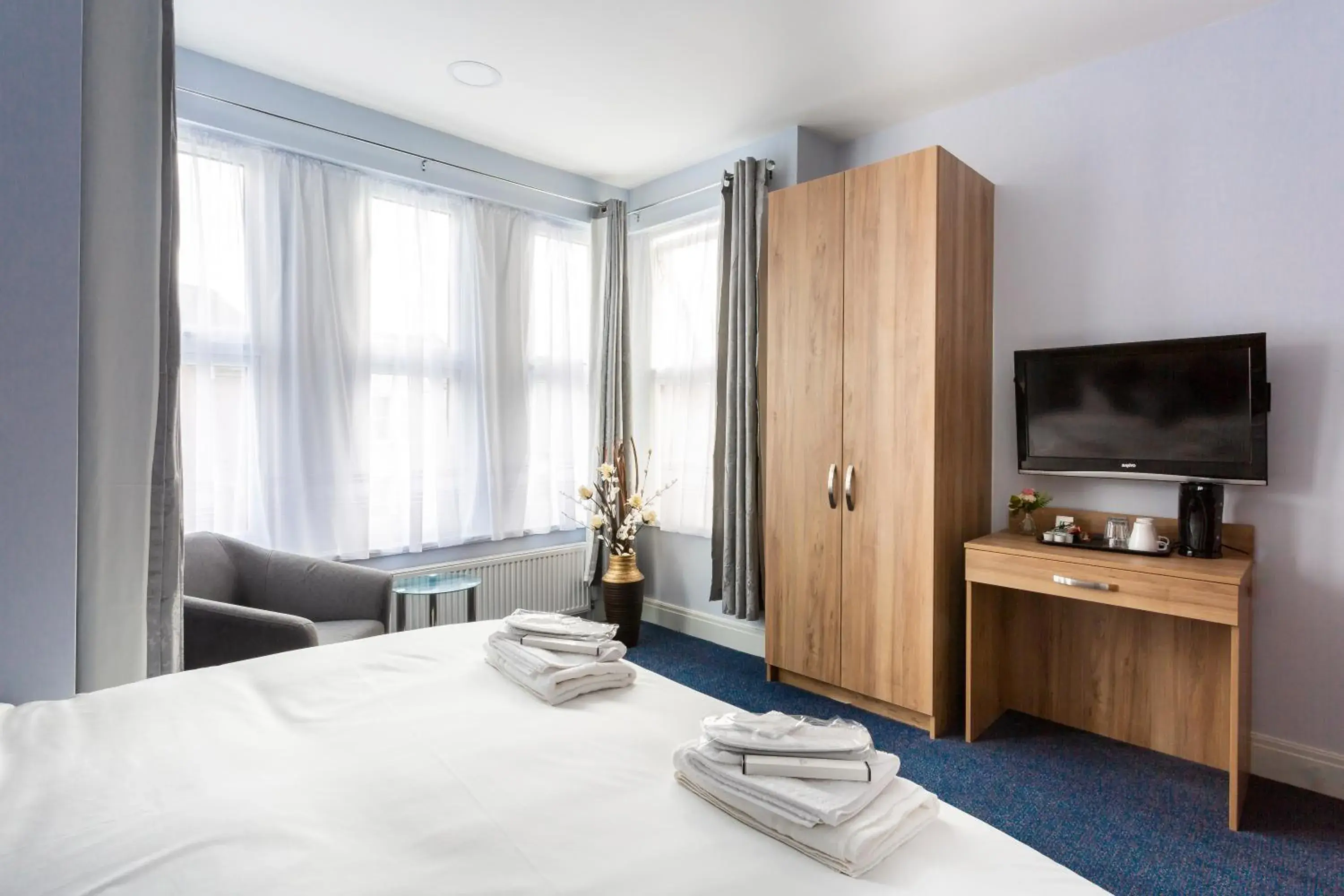 Bed in Wellesley Hotel Bed in Wellesley Hotel