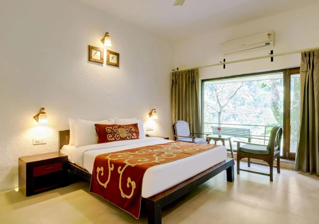 Bed in Summit By The Ganges Beach Resort & Spa